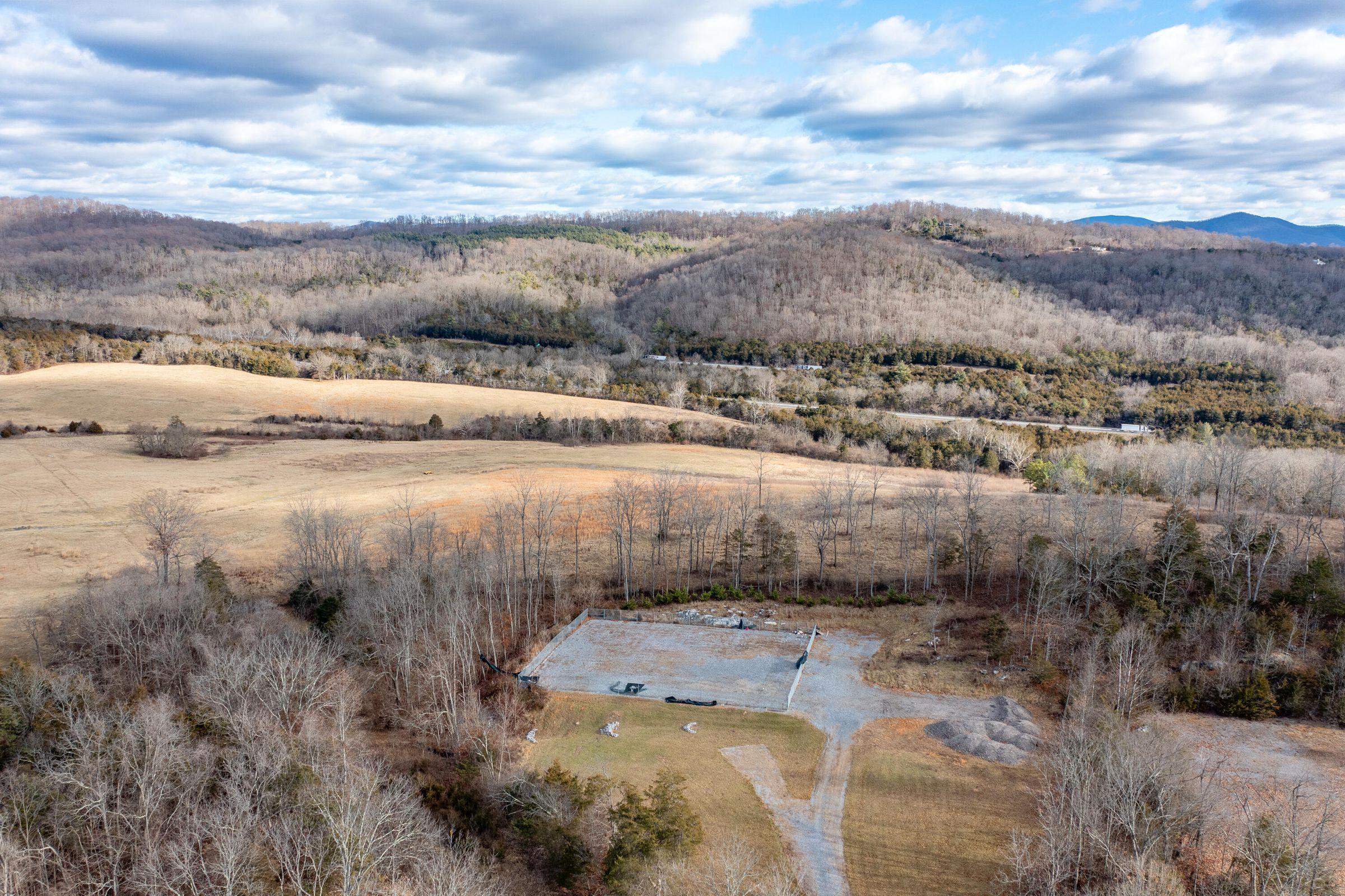This elevated lot offers breathtaking views of House Mountain and beyond to the Alleghenies.