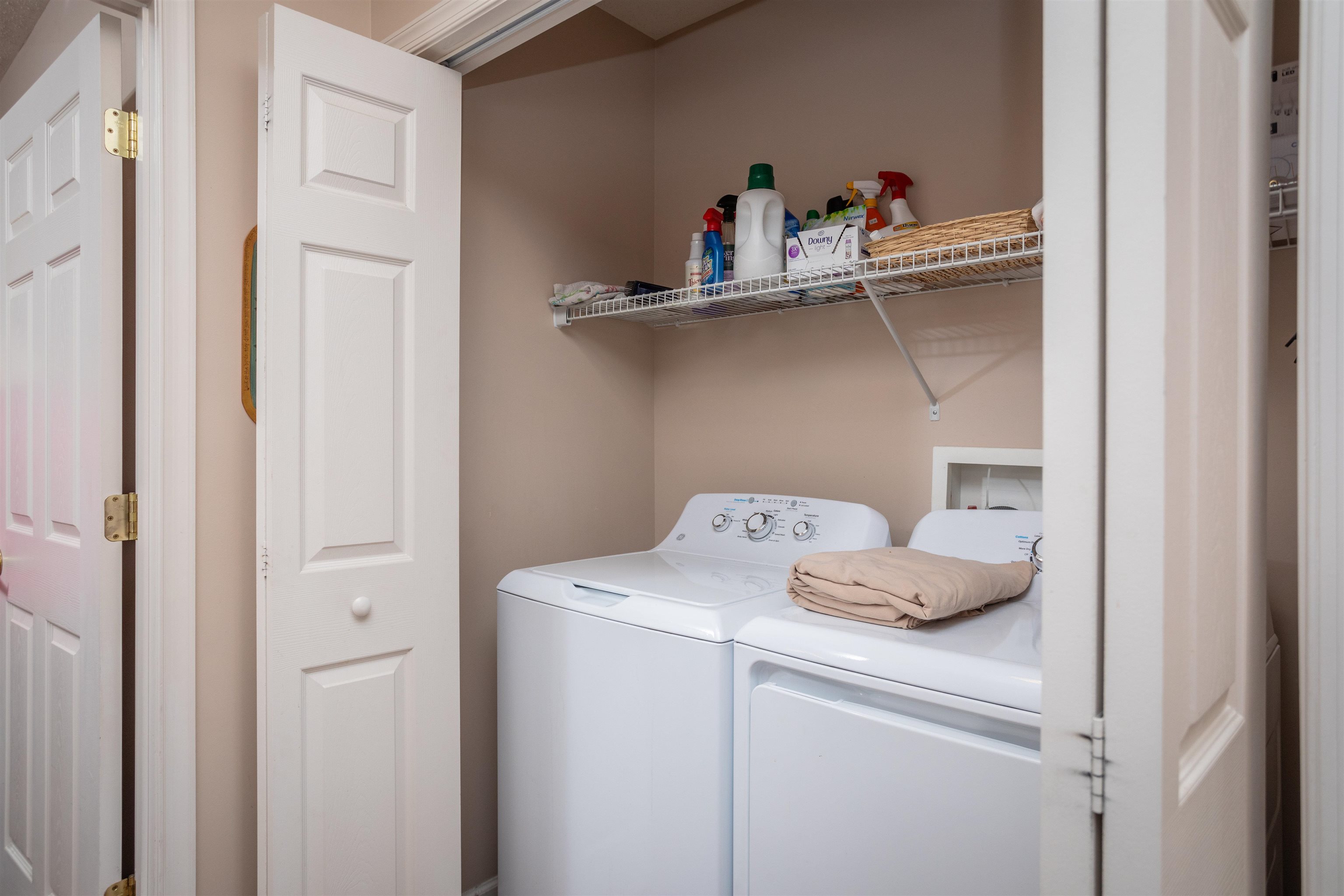 The laundry is conveniently located. The dryer and new washing machine both convey