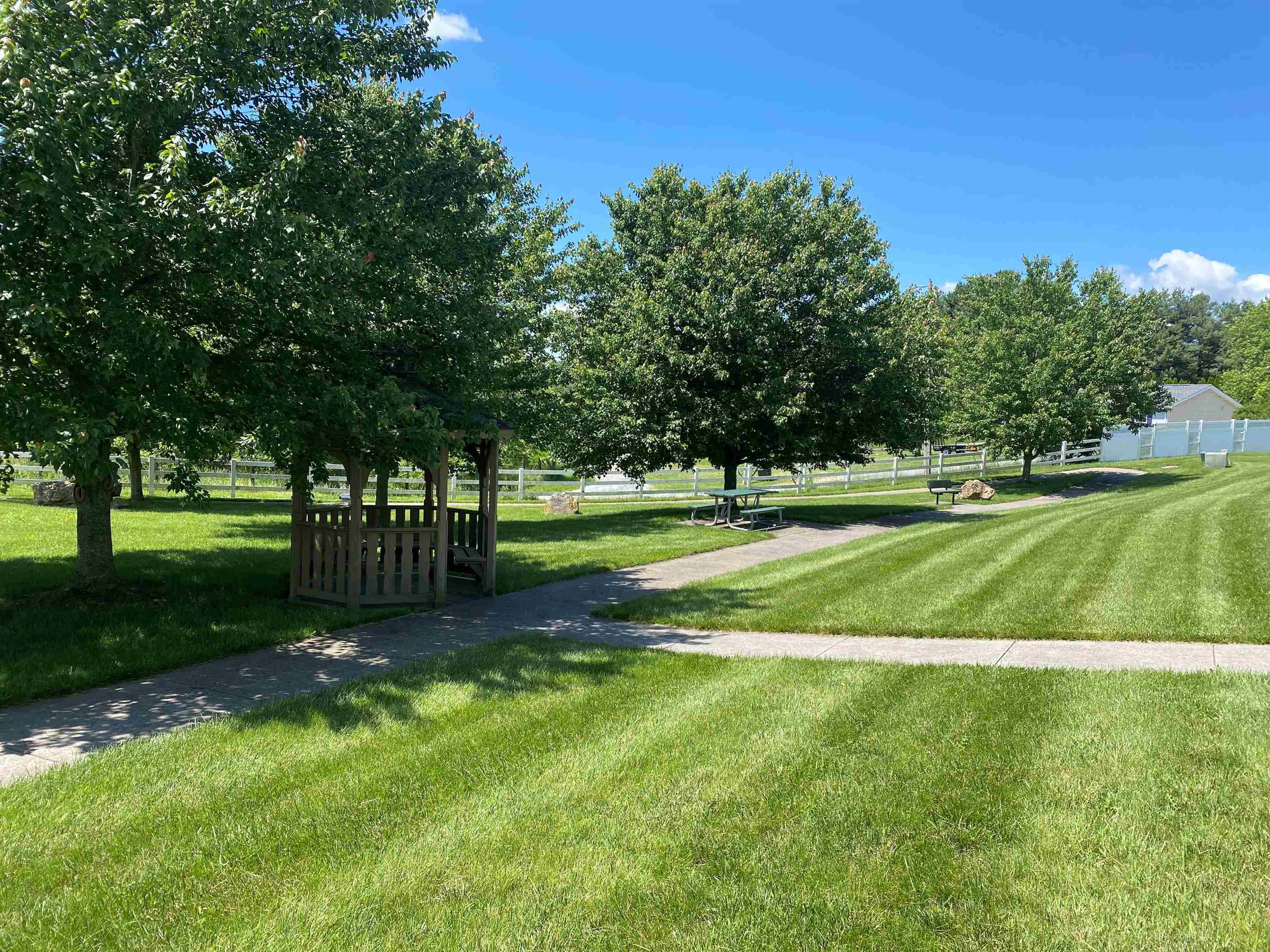 Stroll down the sideway to the subdivision's community park. Enjoy the gazebo and nice mountain views