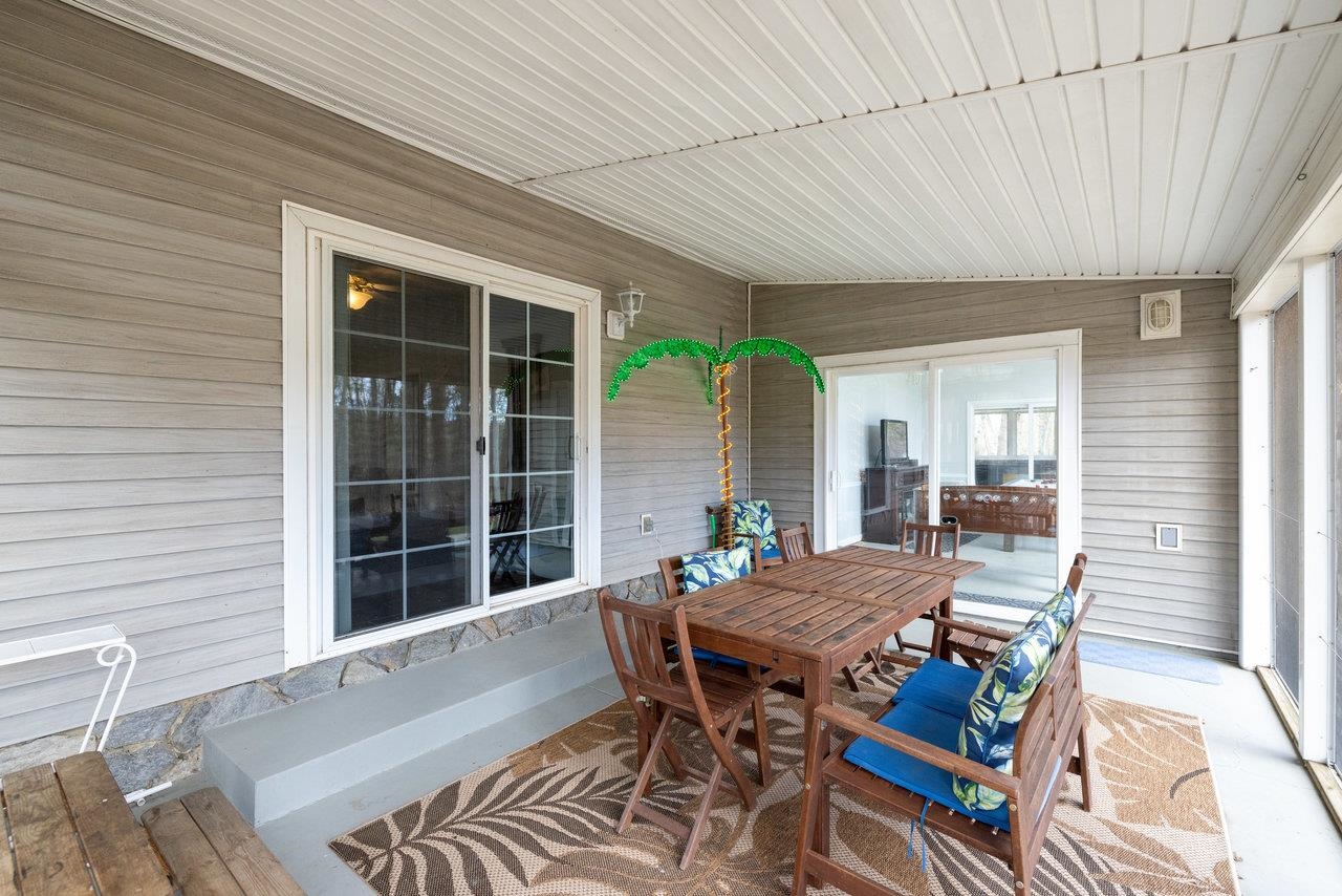 This large screened porch is located off the rec room