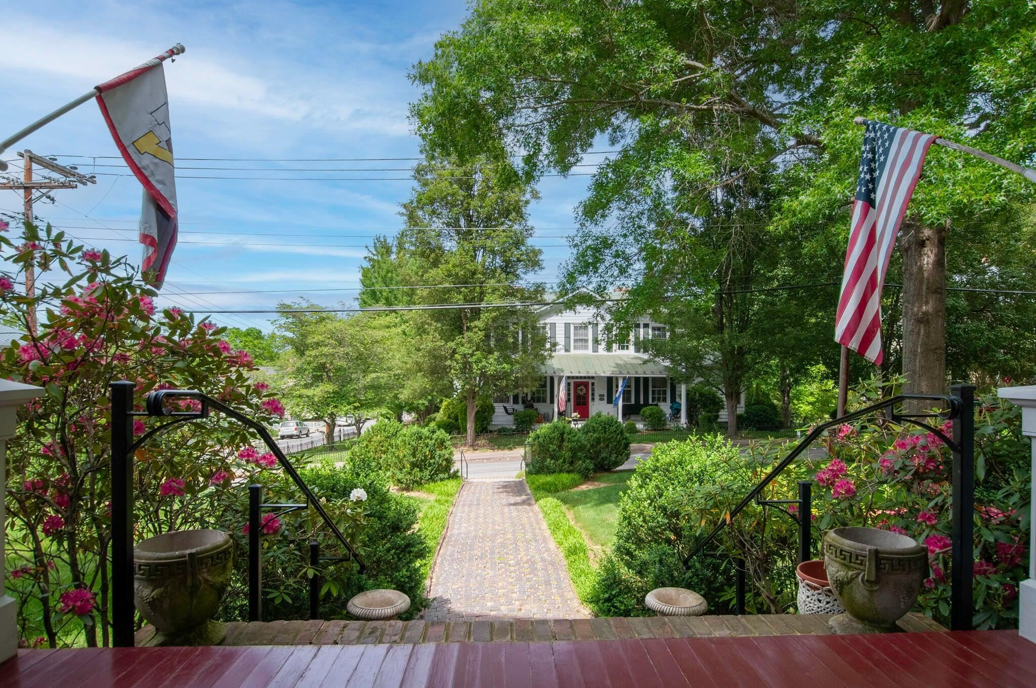 Watch the Lexington Carriage Rides go by, from your front porch.