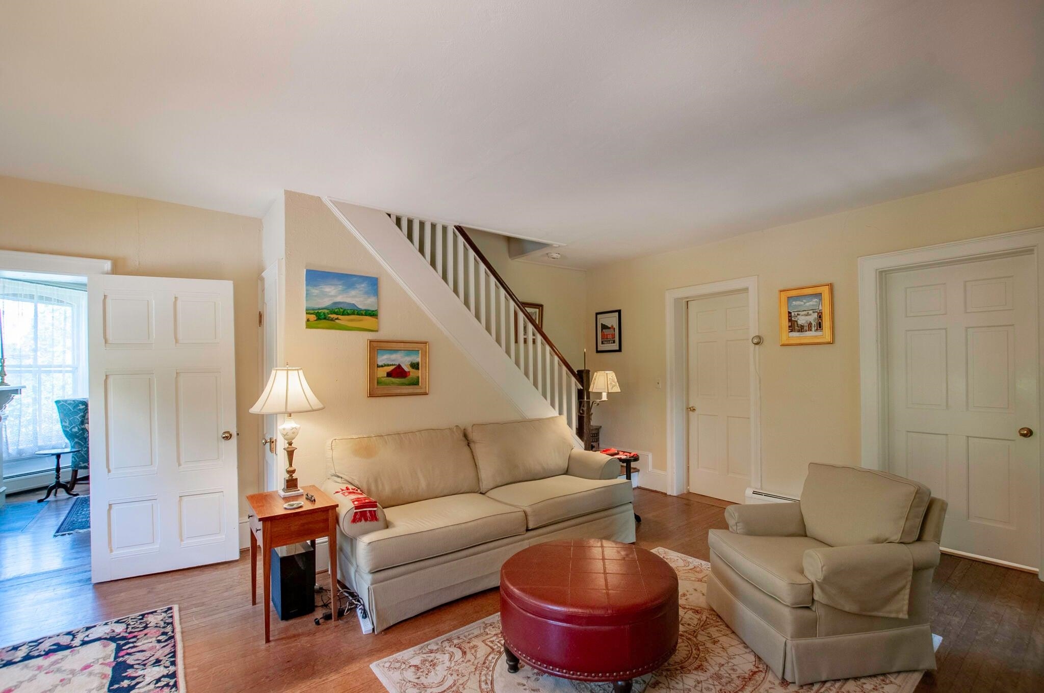 From the dining room, enter the cozy den/TV room.