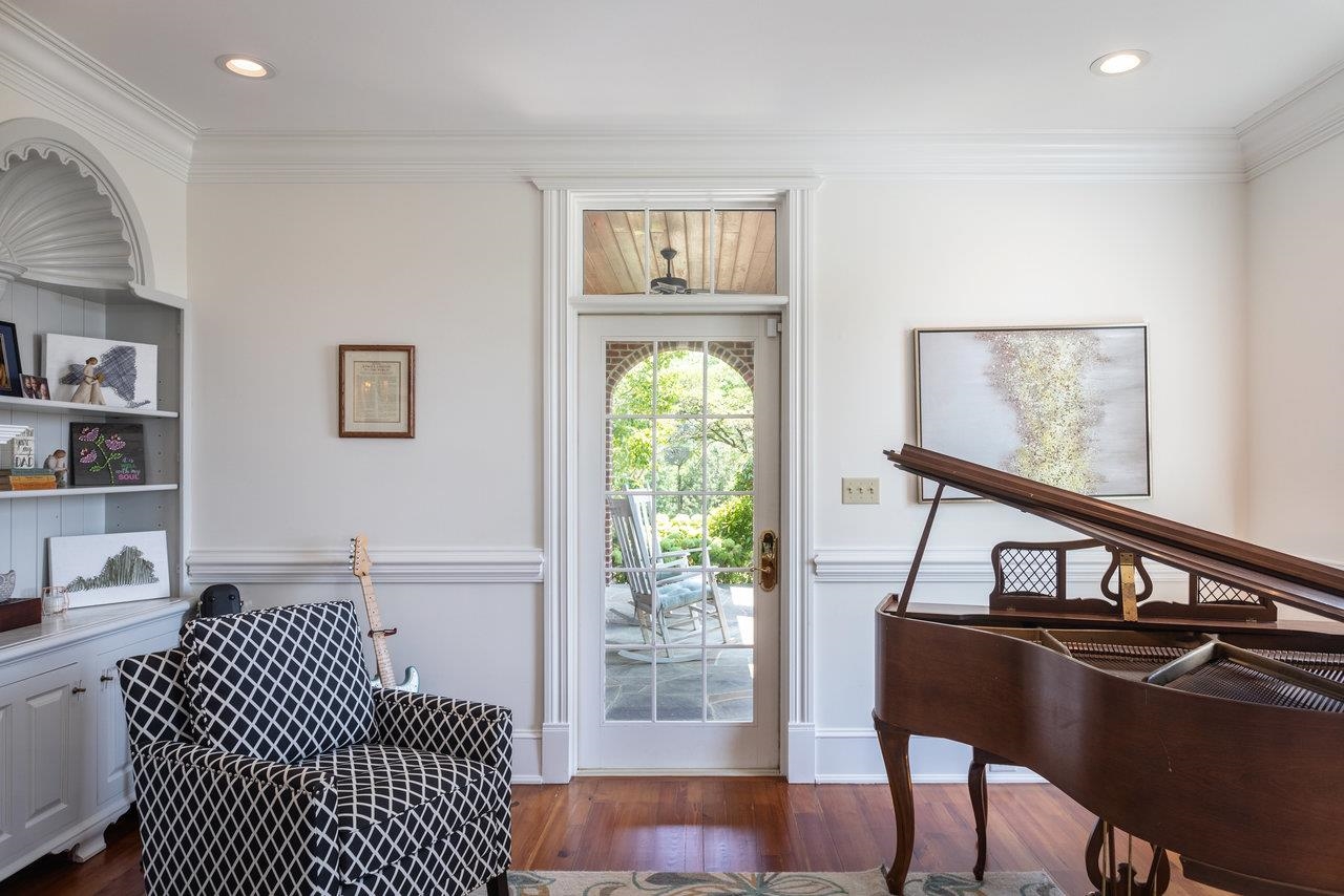 Step out onto the adjoining covered porch and enjoy the mountain view