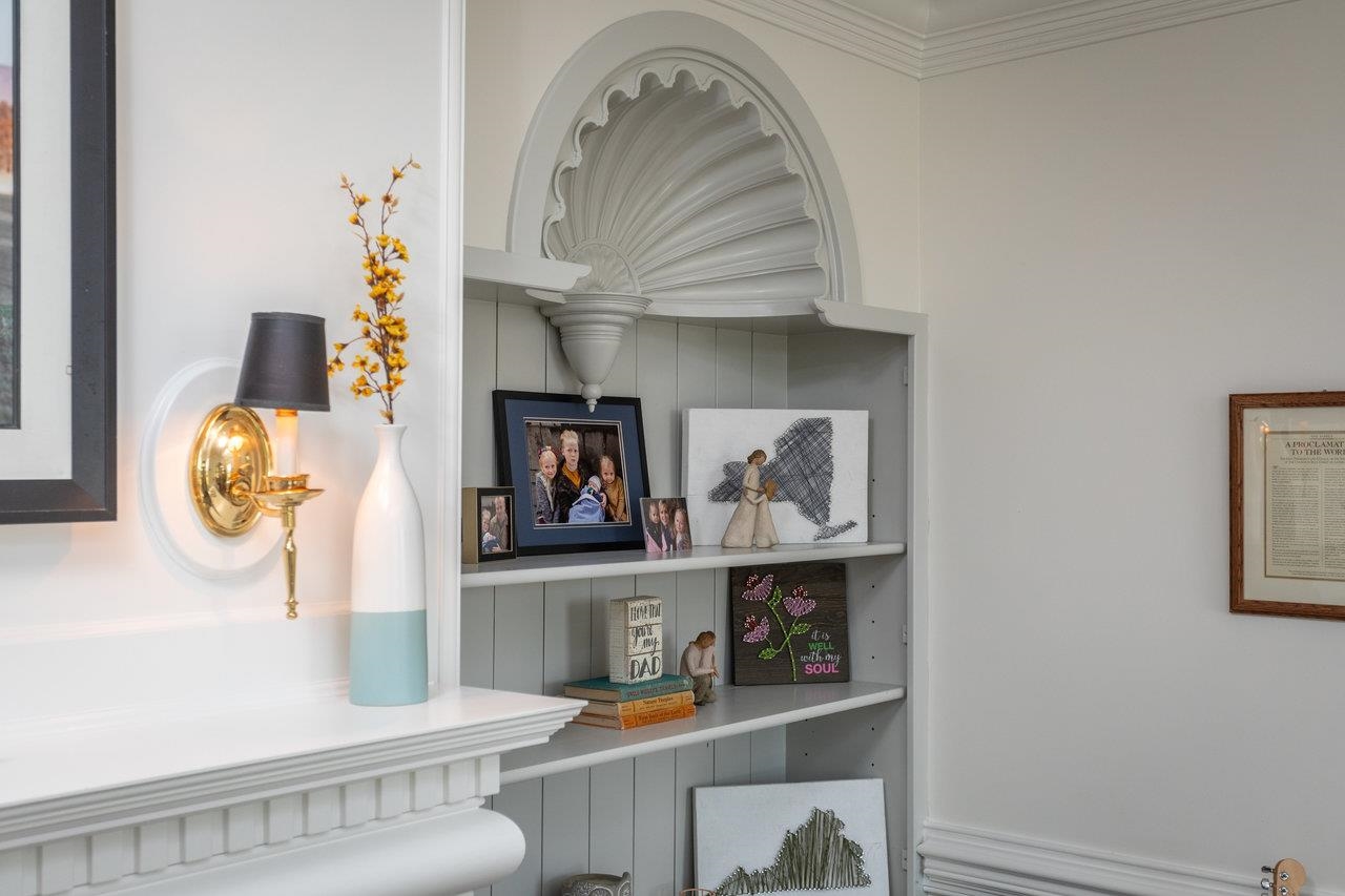 Elegant built-ins on both sides of the fireplace