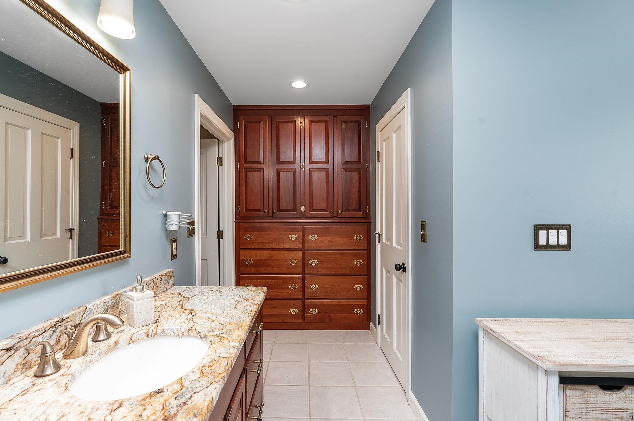 Tile Floors, Tiled shower, Granite counter tops