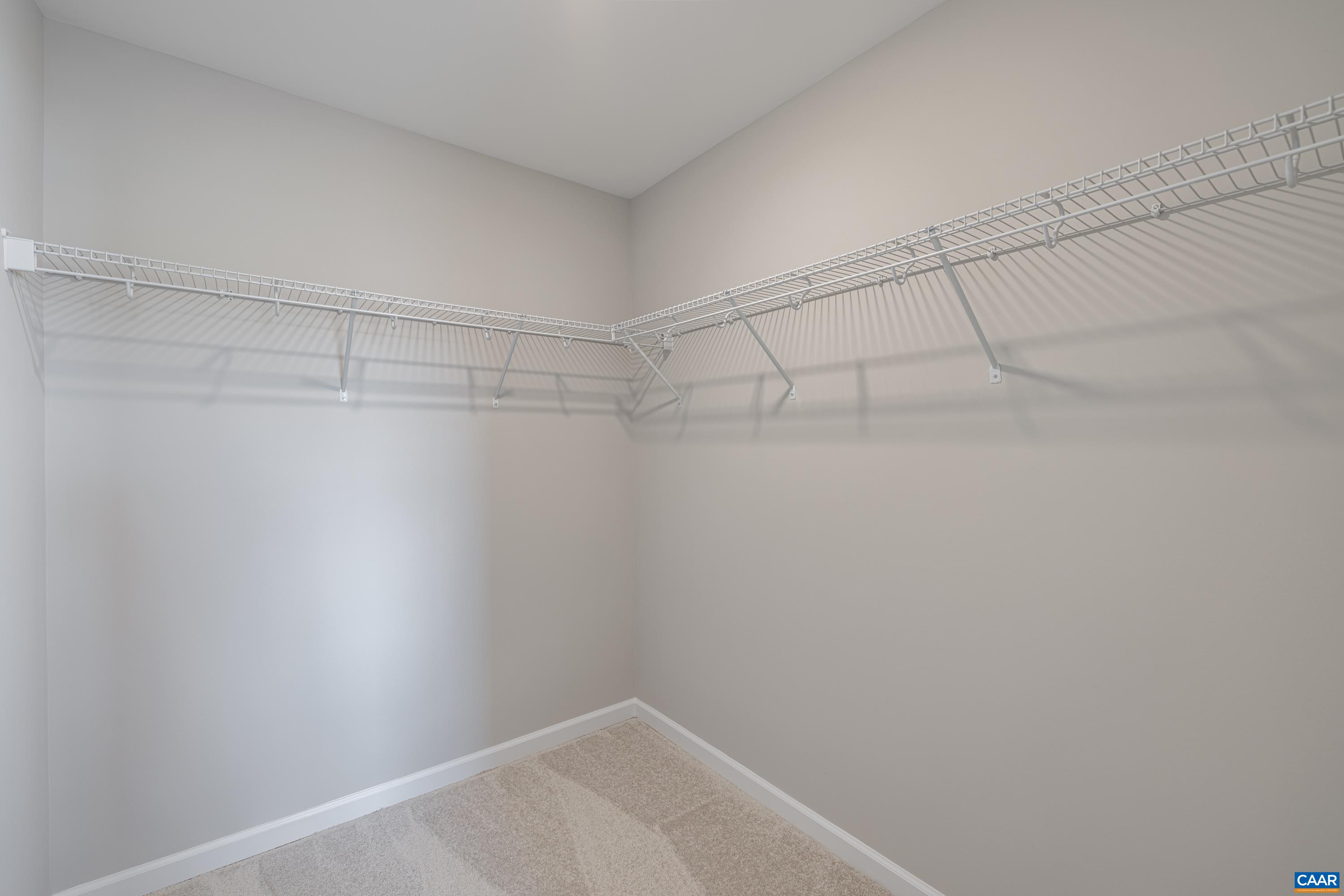 Both guest rooms feature large walk in closets