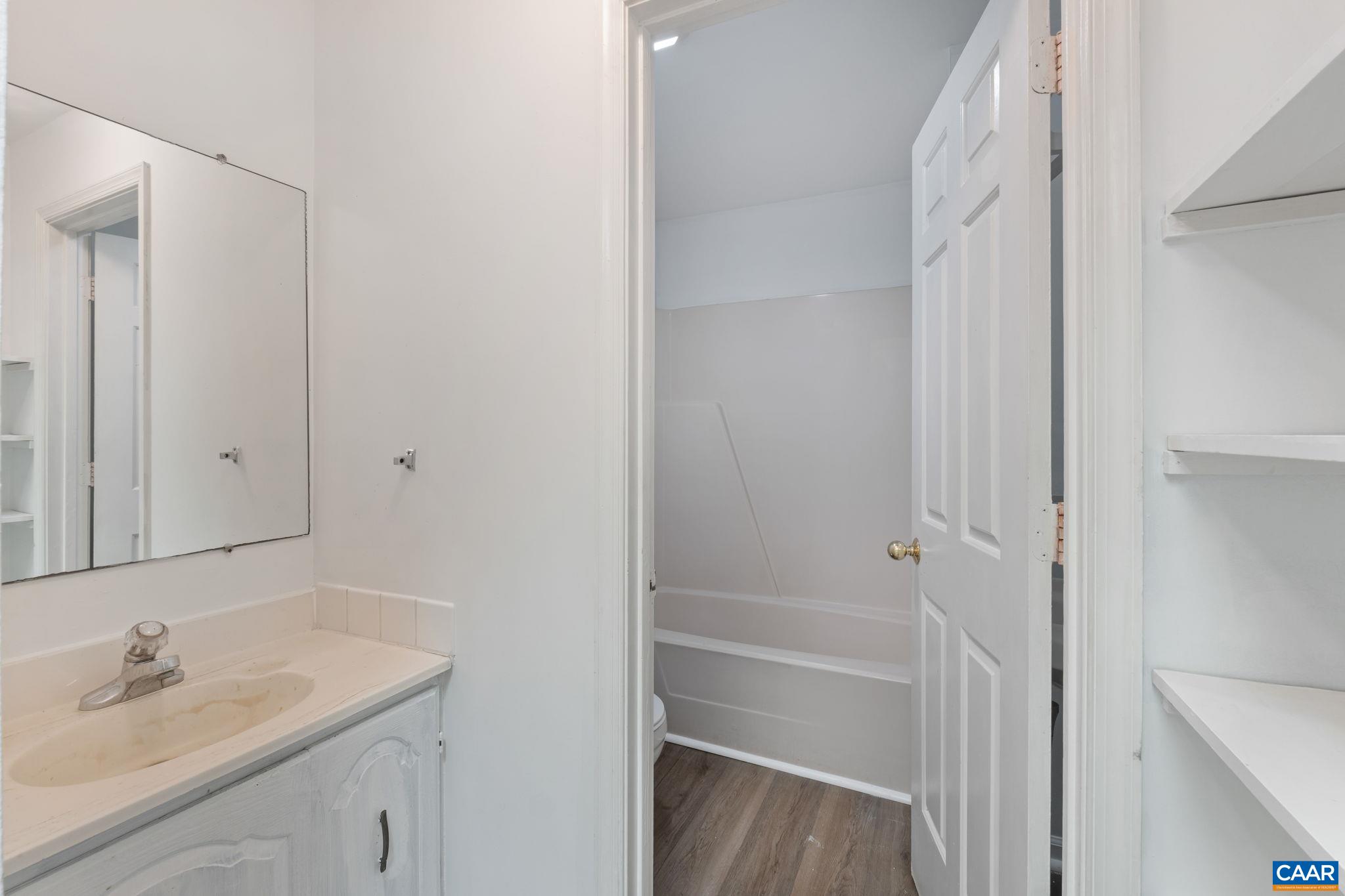 Upstairs Full bath with 2 vanities - B Unit