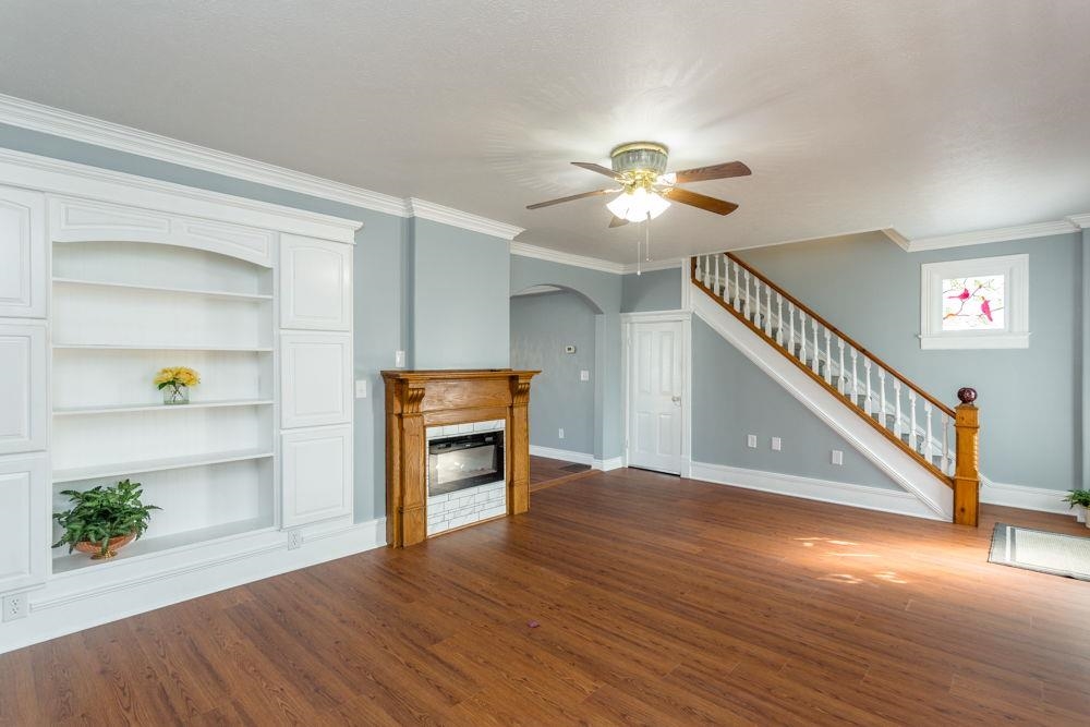 with electric fireplace in old original mantle