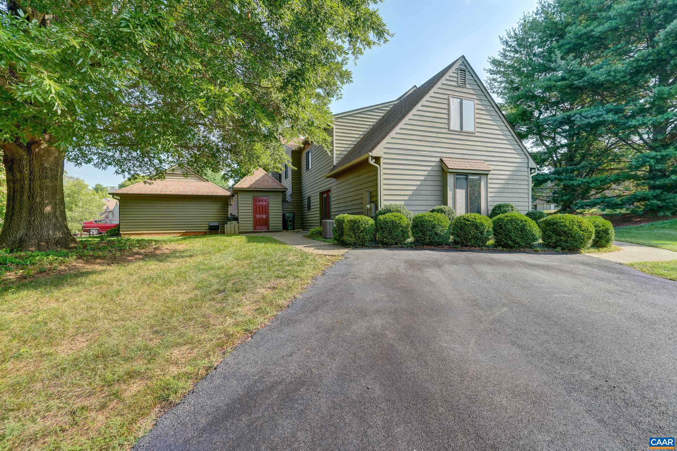 Large driveway provides ample parking space.