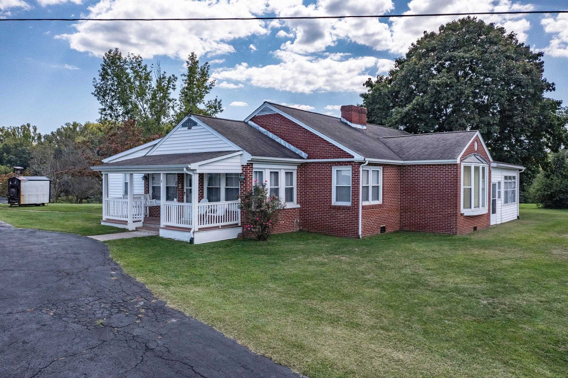 Charming, one-level brick cottage.