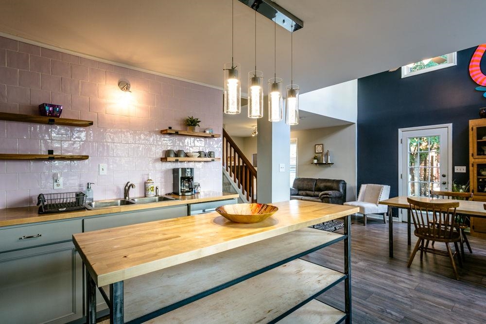 Kitchen open to dining and living room.