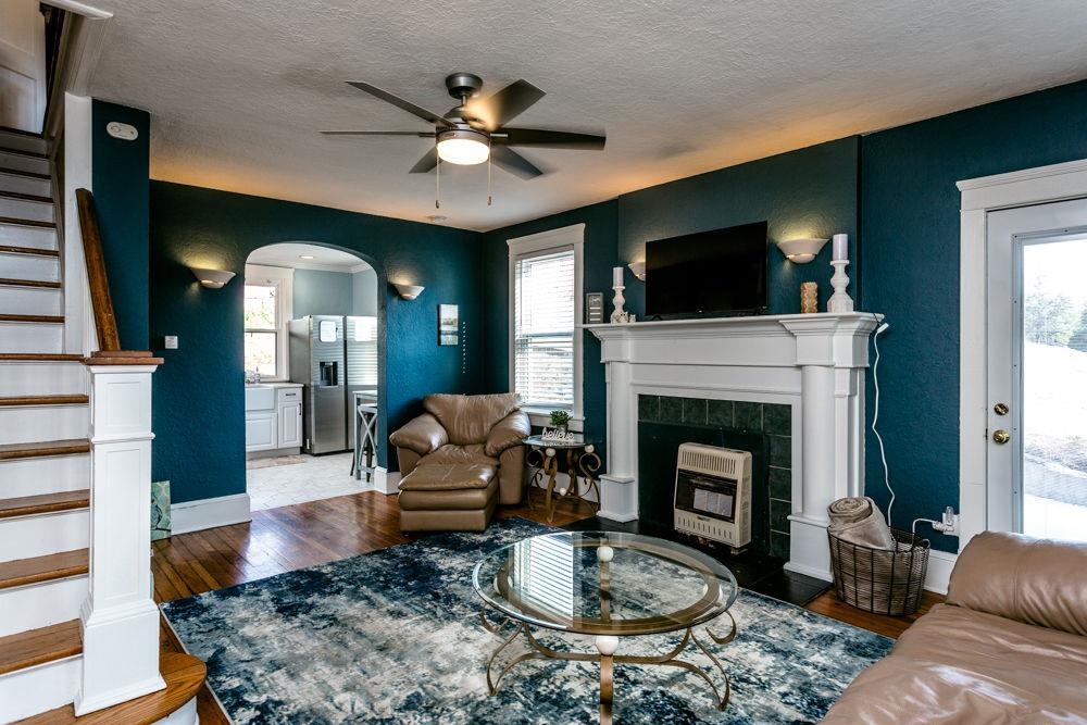 Living room on south side with side door to patio.