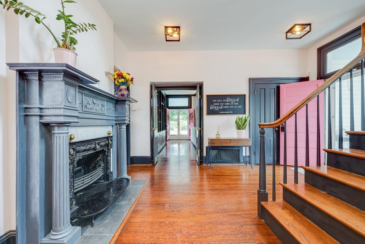 View from Foyer to Living Room & Side Porch