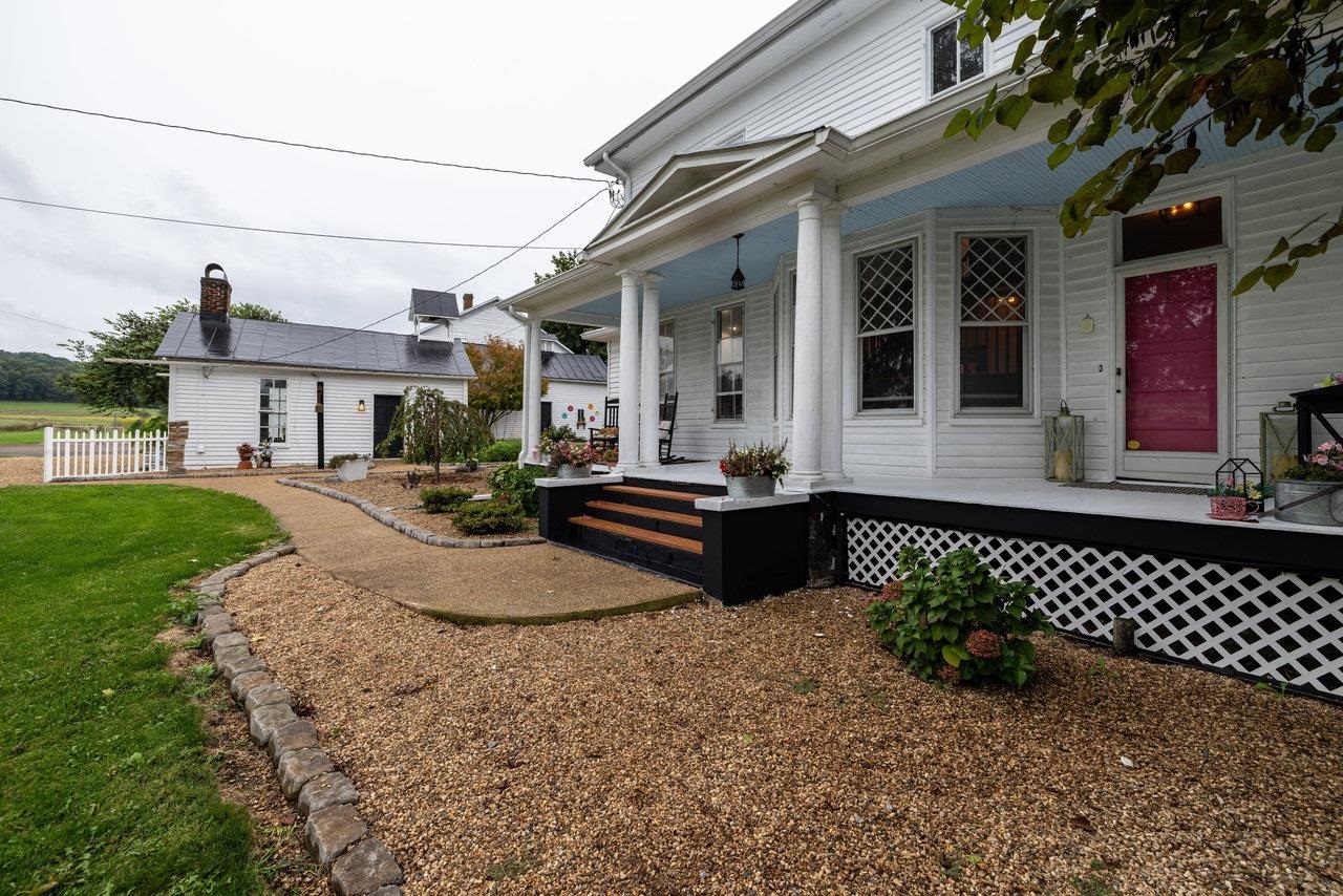 Main House Front Landscape and View to Bell House