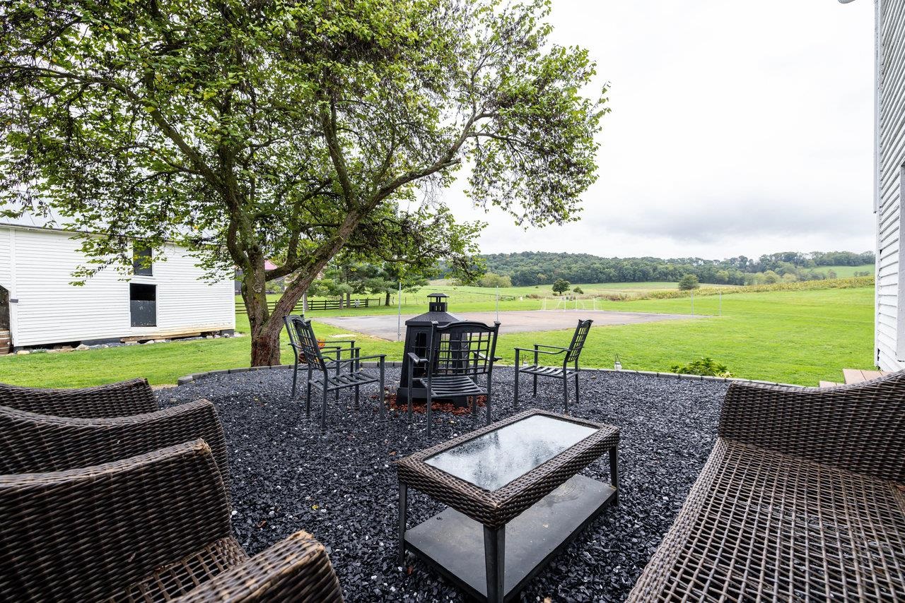 Gravel Patio & Fire-Pit Outside Back of Game Room