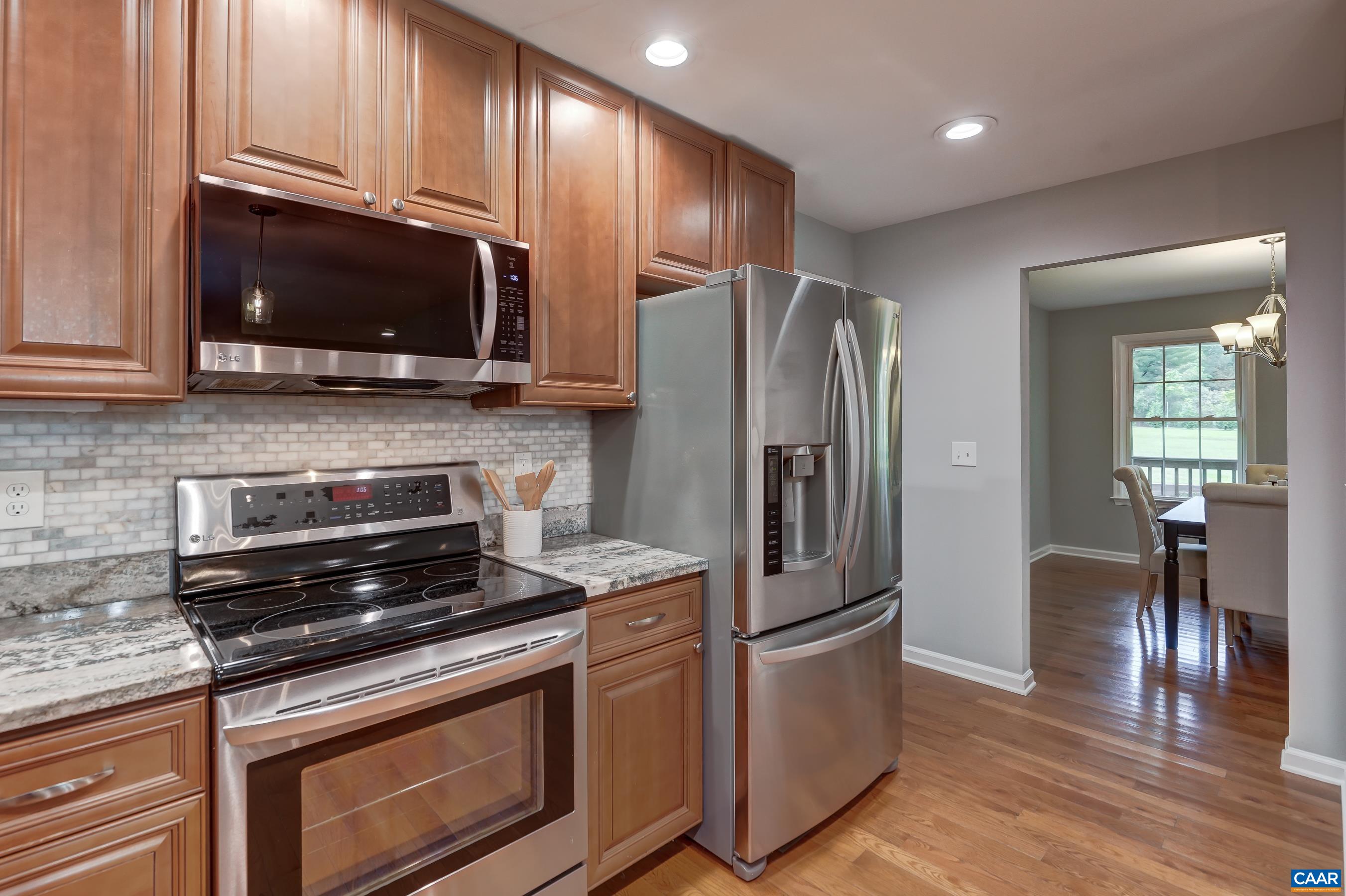 New microwave and dishwasher in kitchen.