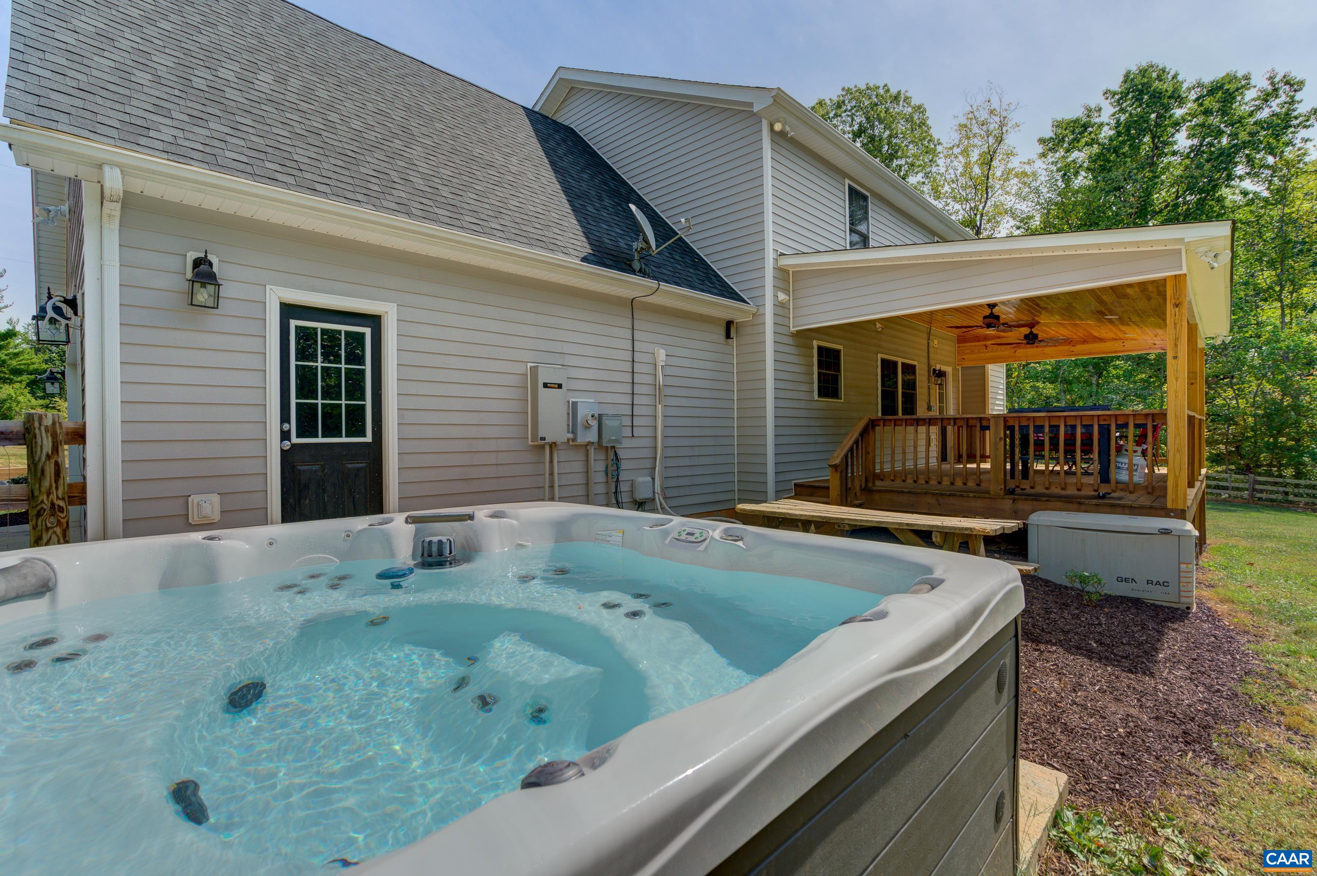 Soak your cares away in the hot tub!