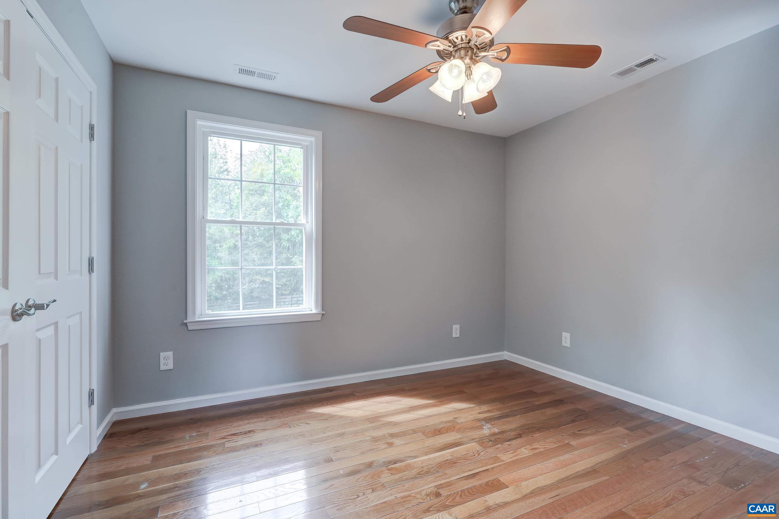 Bedroom 2 with ceiling fan.