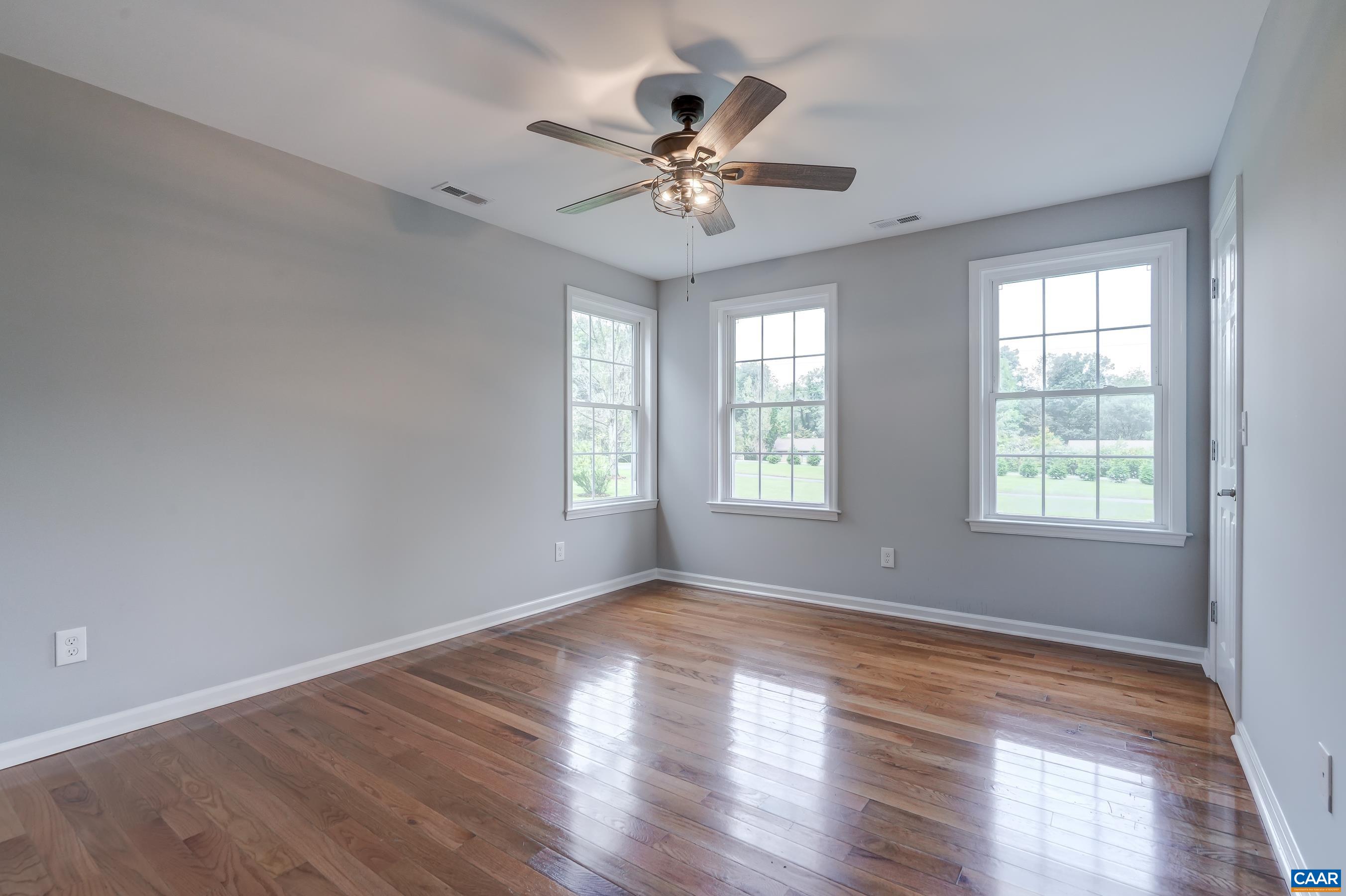 Bedroom 3 with ceiling fan.