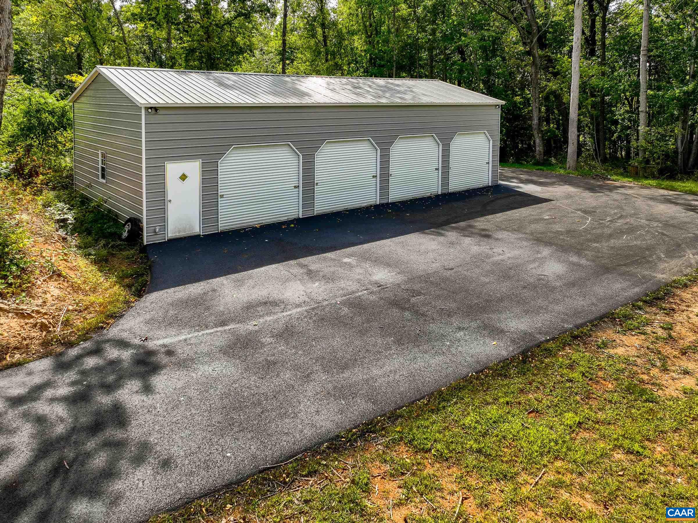 Detached 24'x56' four car garage for even more storage!