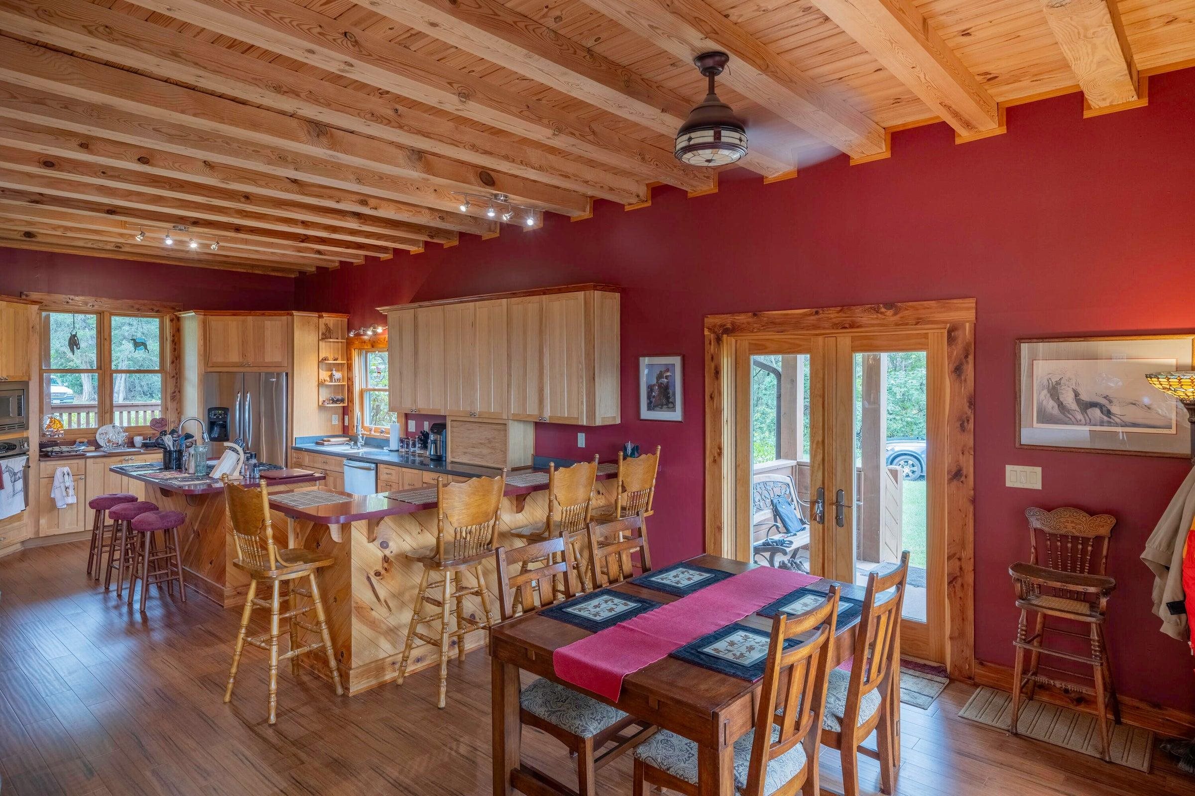 Side entrance leads into the open kitchen dining area.