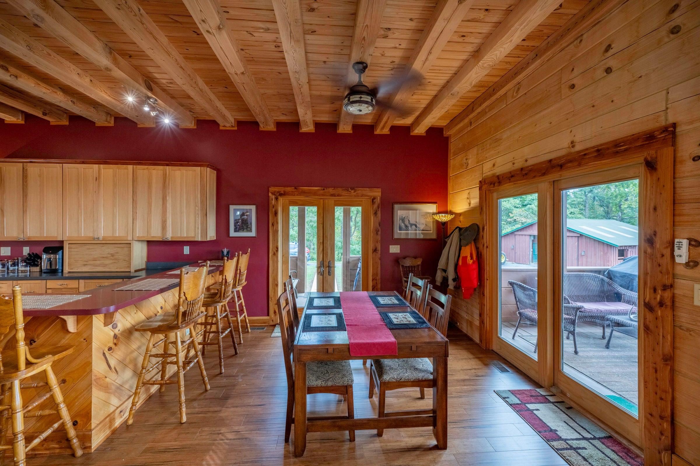 Spacious dining area near to the deck, featuring Blue Ridge views.