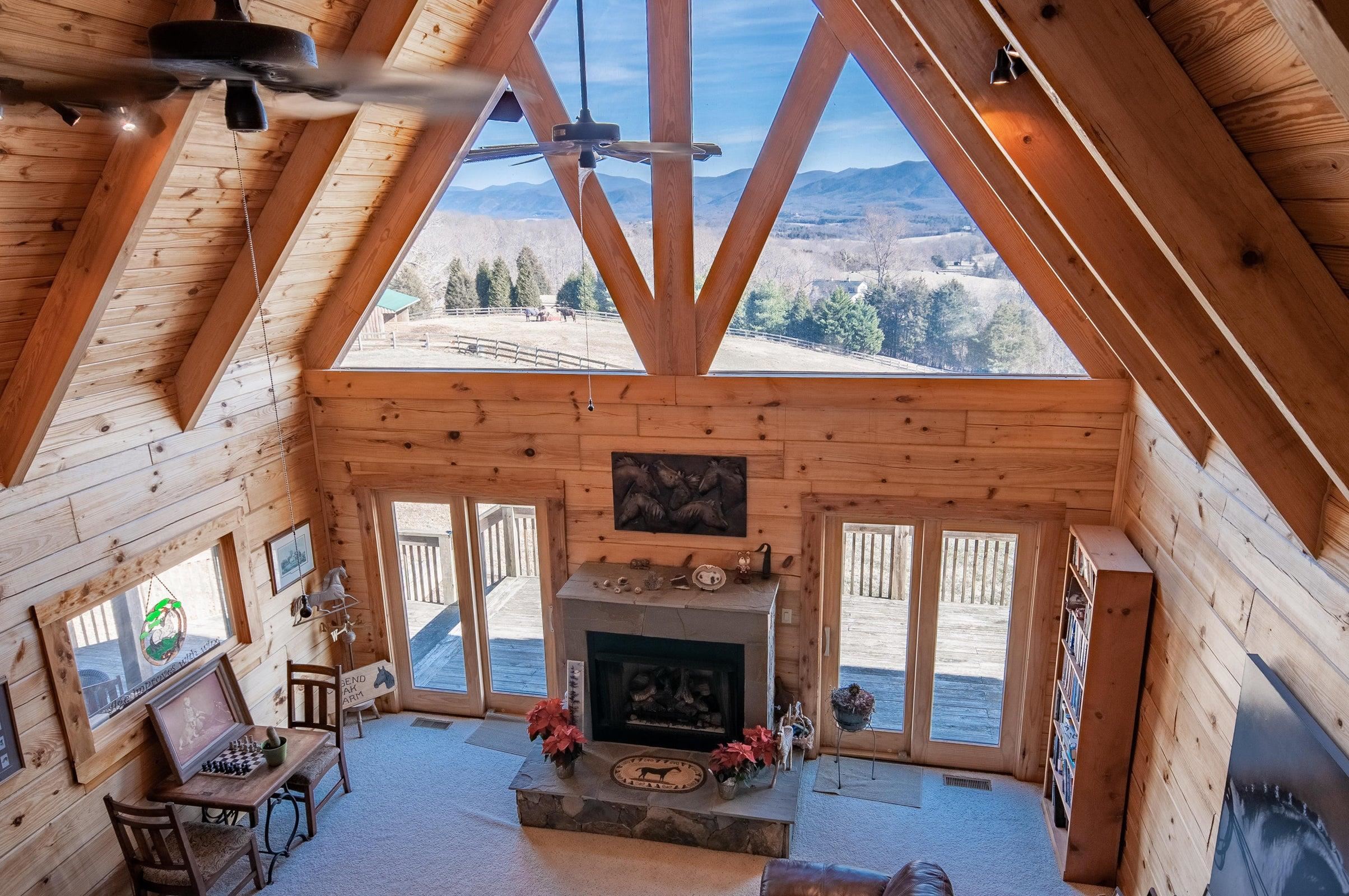 View of pastures and Blue Ridge Mountains through the Great Room from 2nd fl. loft.