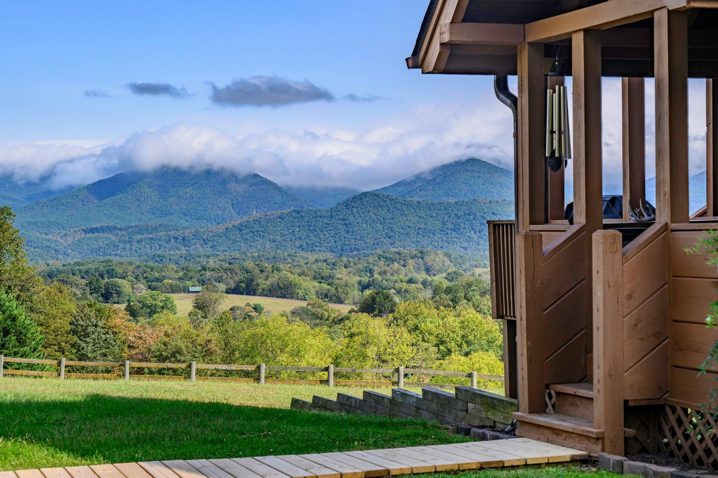 Ever-changing, always entertaining views of the Blue Ridge. This view is while entering your side door to the kitchen and dining area.