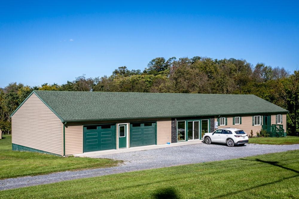 Double Garage & Sunroom/Family Room