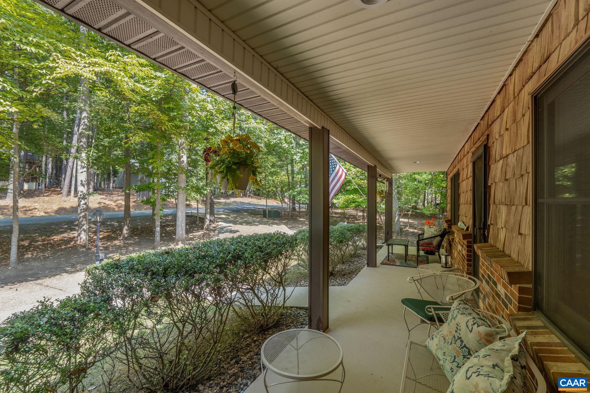 Sit back and sip Sweet tea from this massive front porch