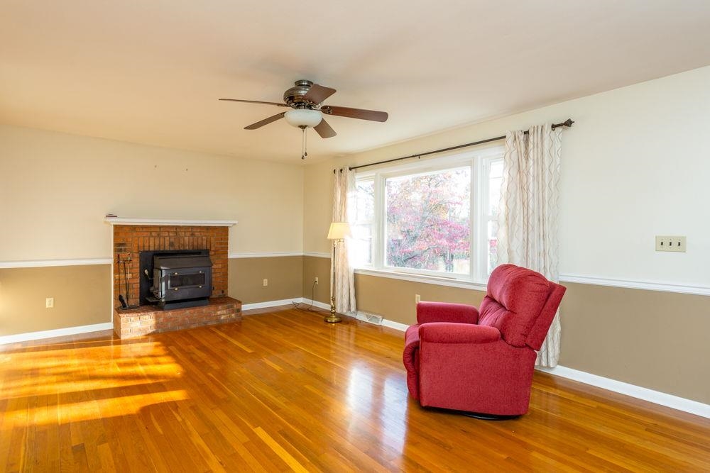 Beautiful hardwood floor and wood burning fireplace!