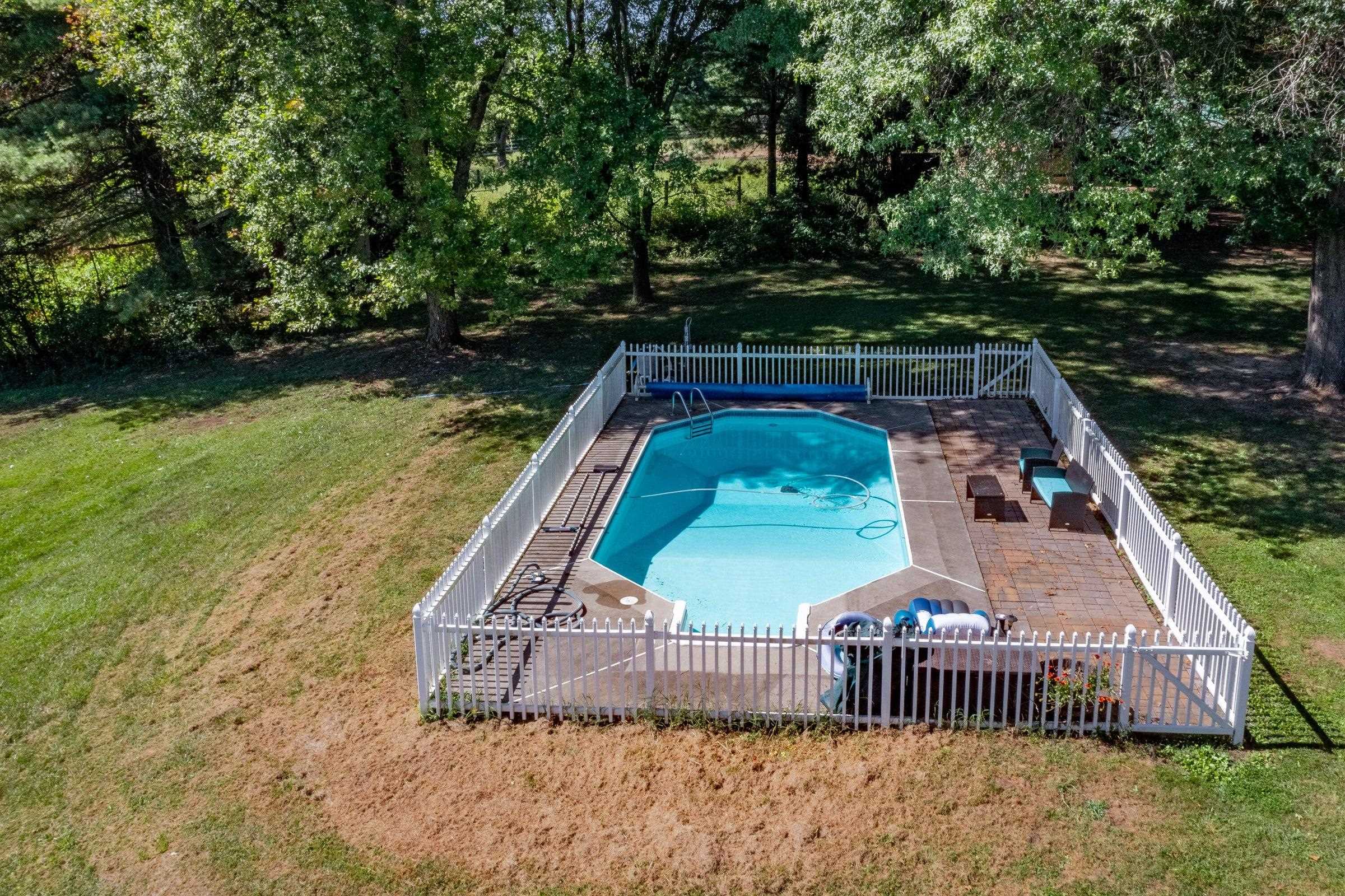 Protective fence around the in-ground pool.