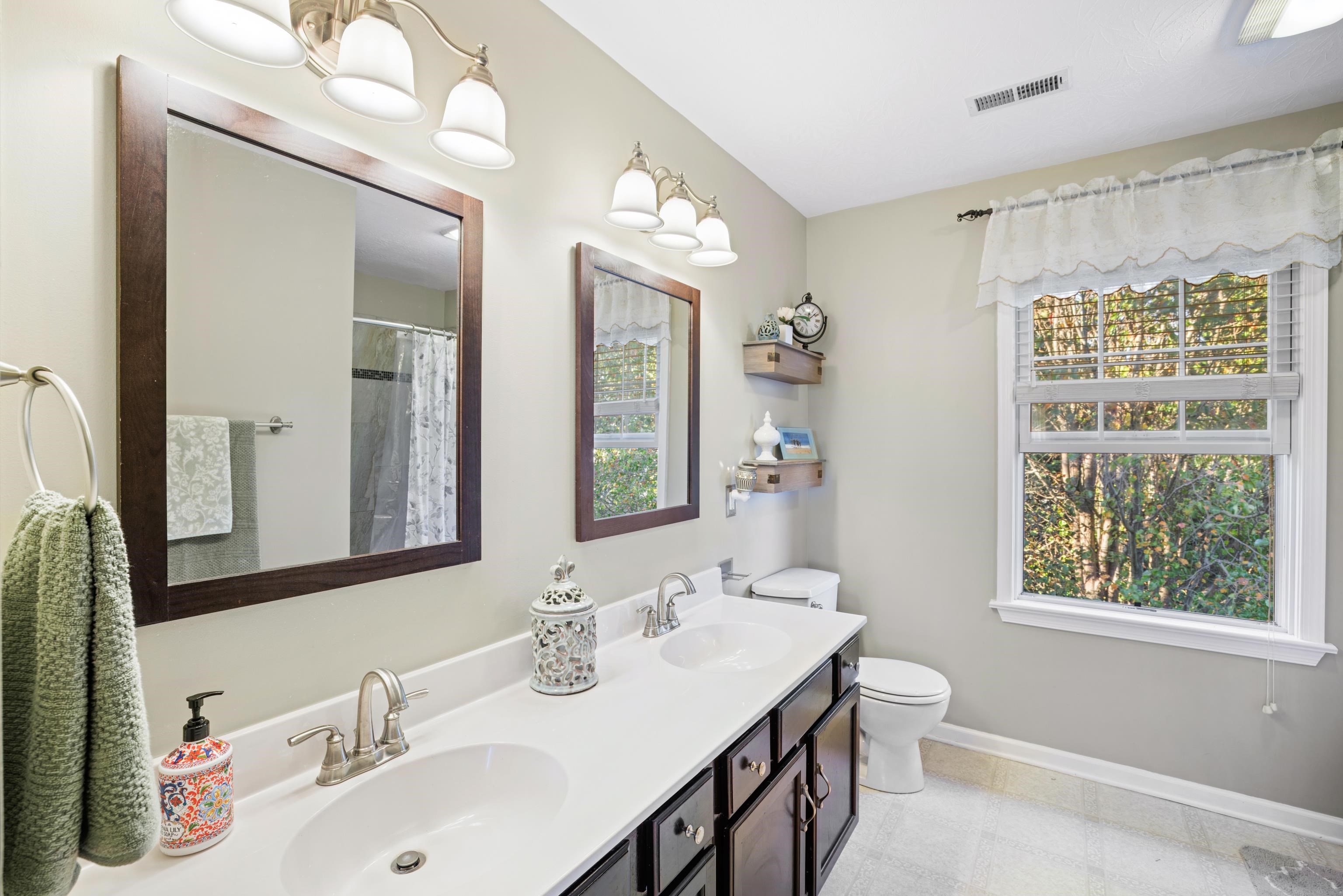 *double sinks *new deep soaker tub with tiled surround