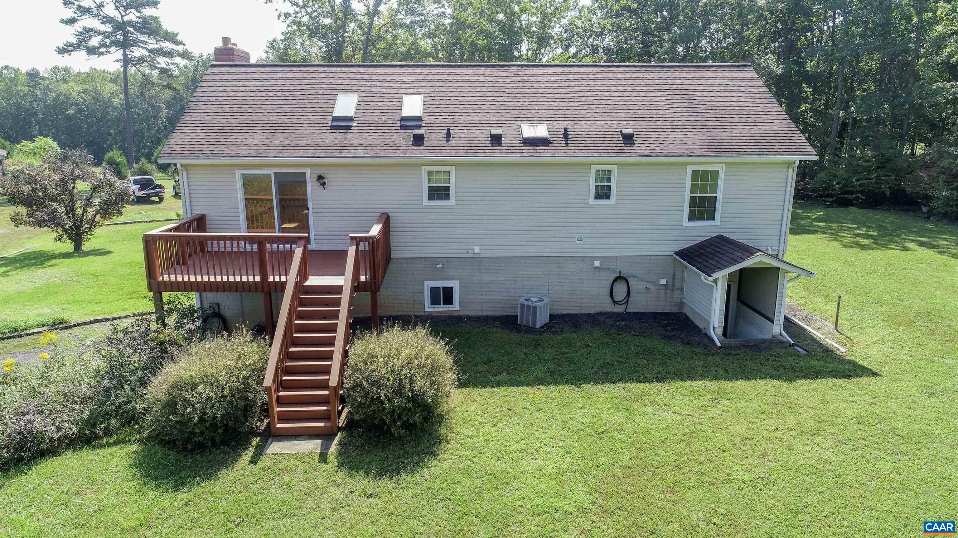 showing large deck and skylights.