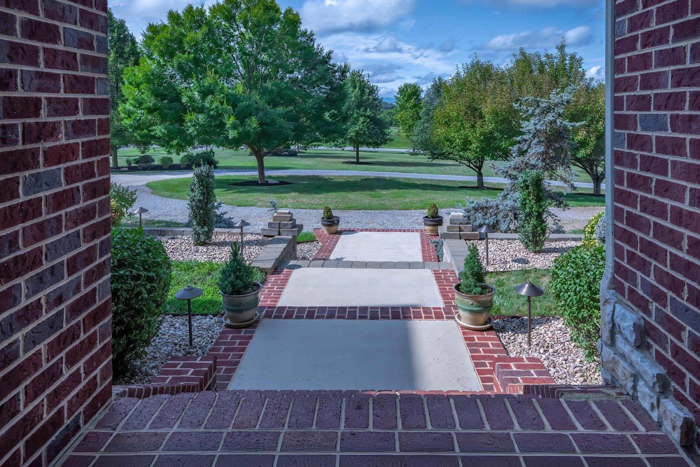 Welcome to the front porch: solid brick entryway.