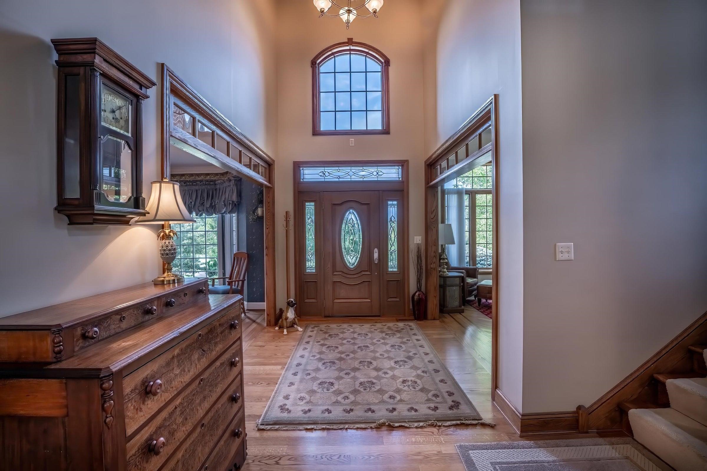 Entry hall flanked by the formal living room and the dining room.