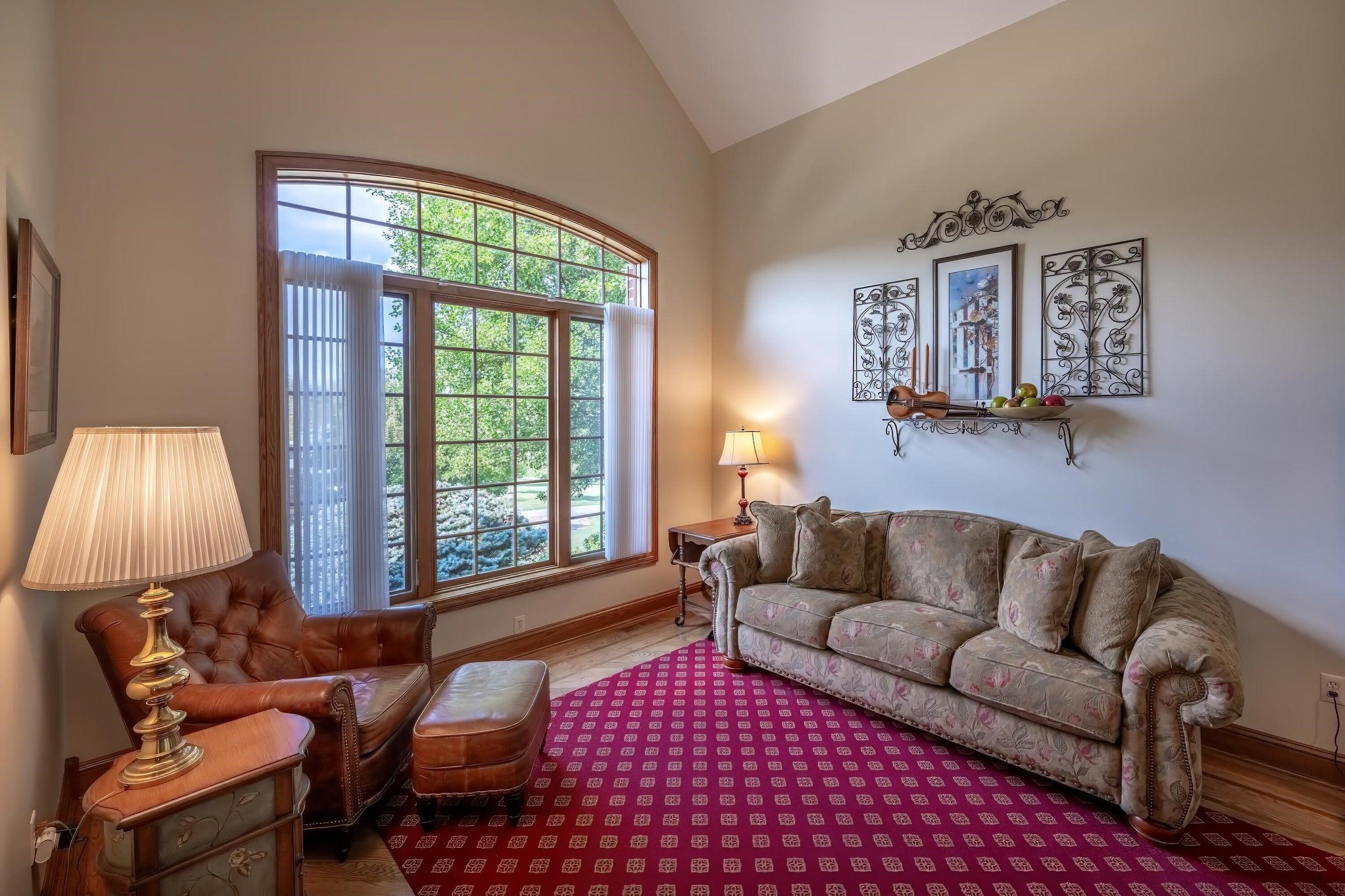 Elegant front parlor with vaulted ceiling.