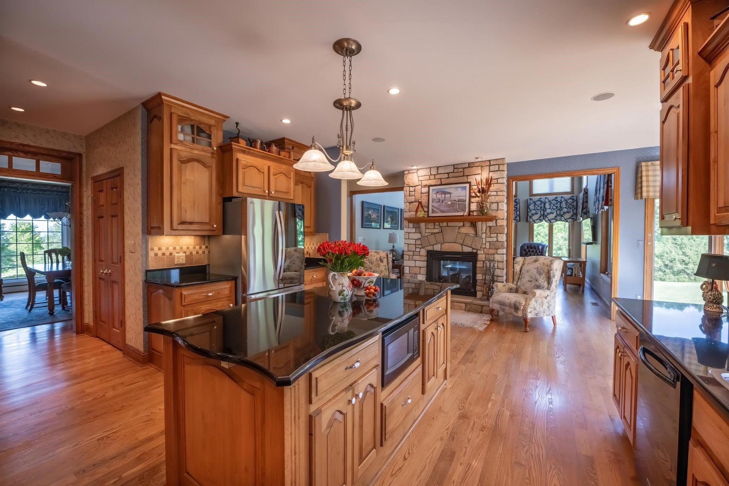 Open floor plan easily flows from one room to another, making this space perfect for entertaining.