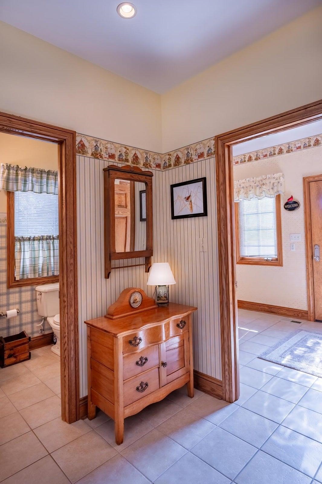 Hallway off the side entry, also opens to a main level Guest Half Bath.