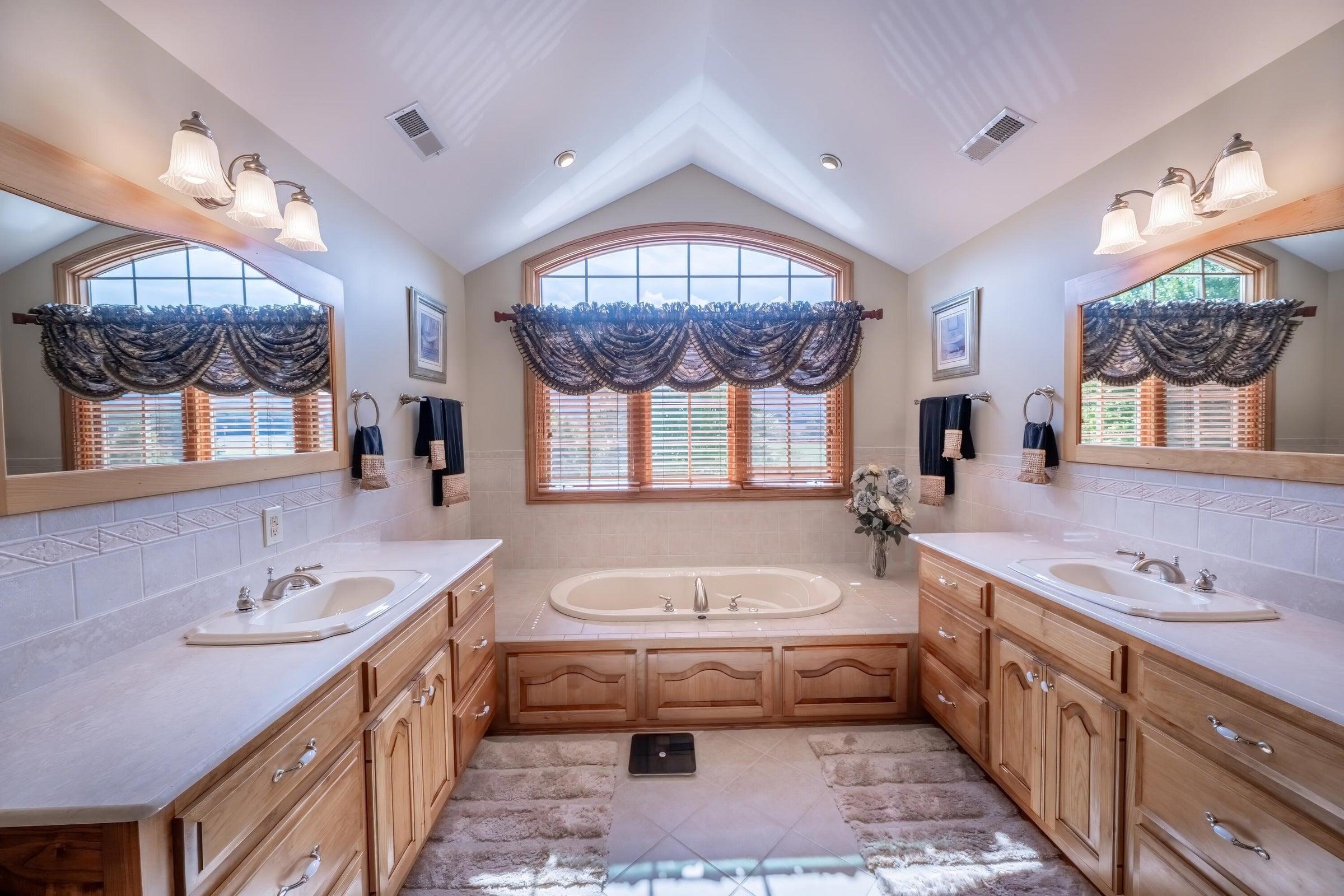 Master BA  En suite Master Bathroom features custom red birch cabinets