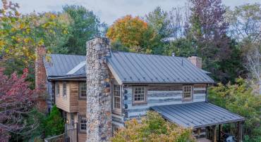 f you are a log cabin enthusiast, this creative merger of two historic log homes (1780's and 1860) will be super-attractive to you.