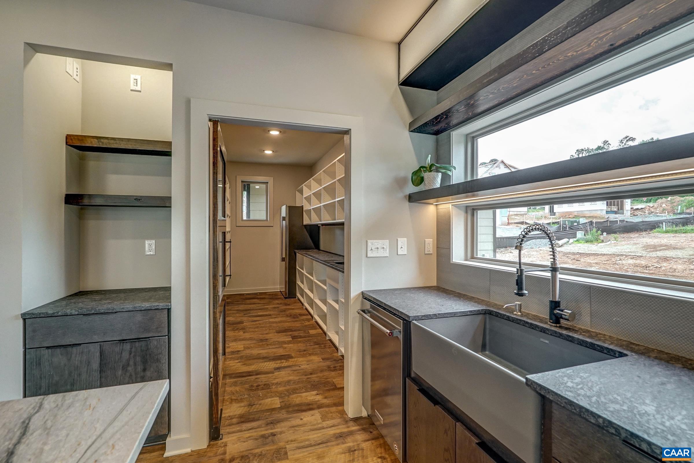 Extra storage above and expansive walk-in pantry.