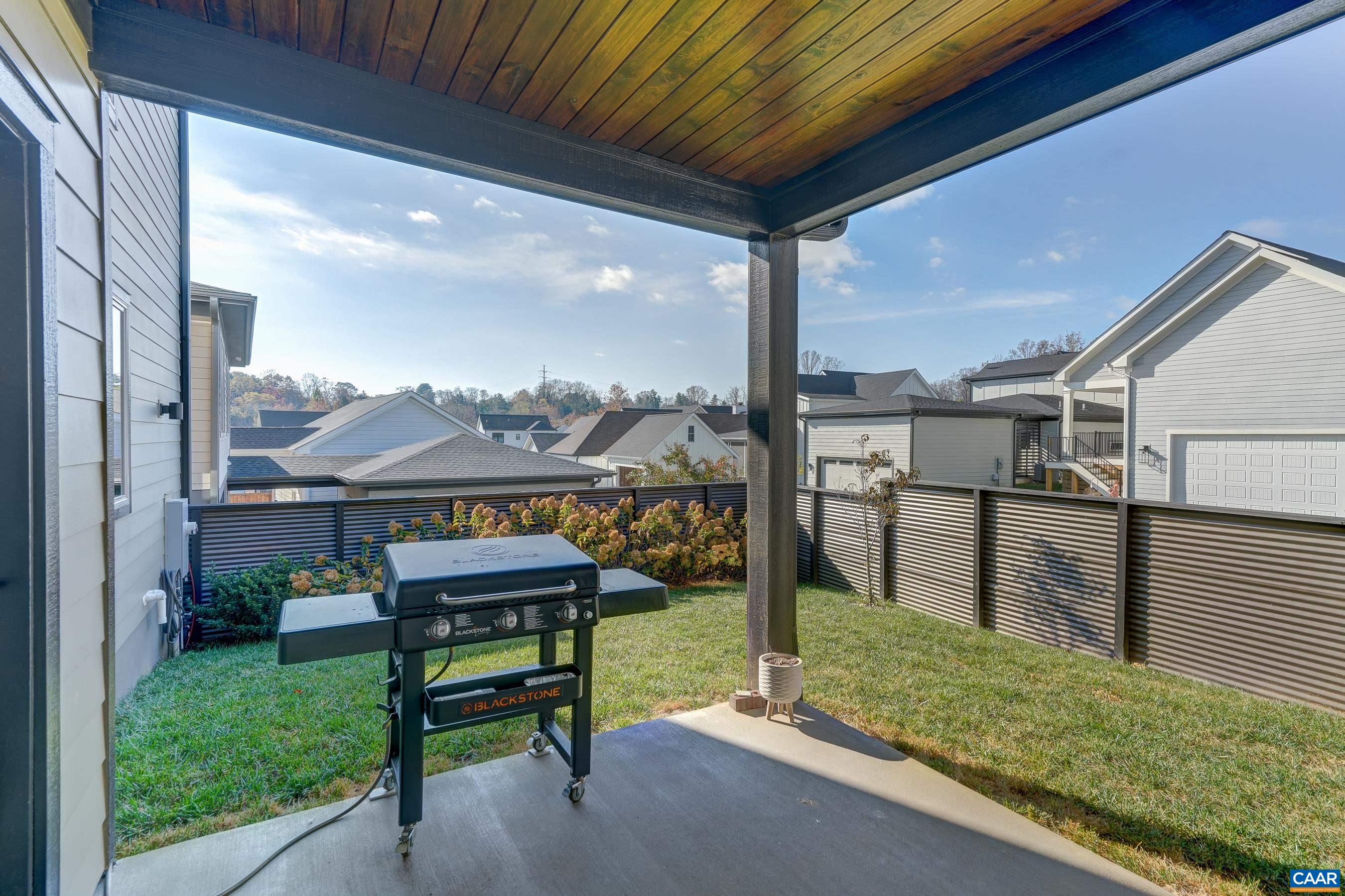 Flat back yard with 6' privacy fence.