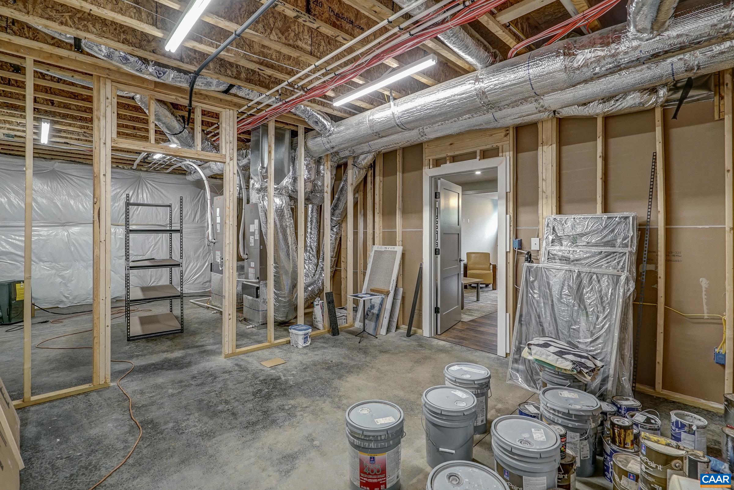 Unfinished space on lower level features a sauna too!