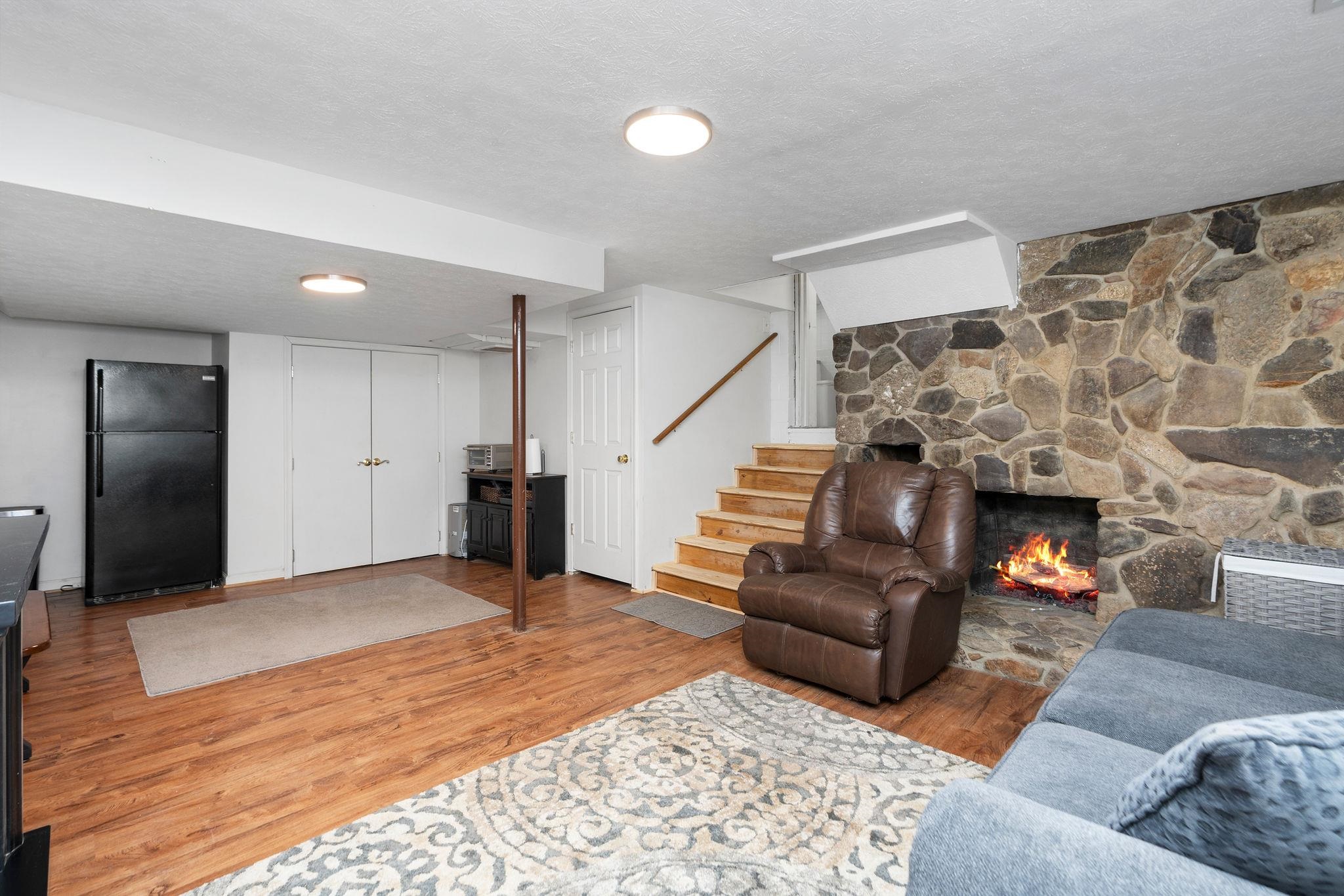 on basement level with propane fireplace.