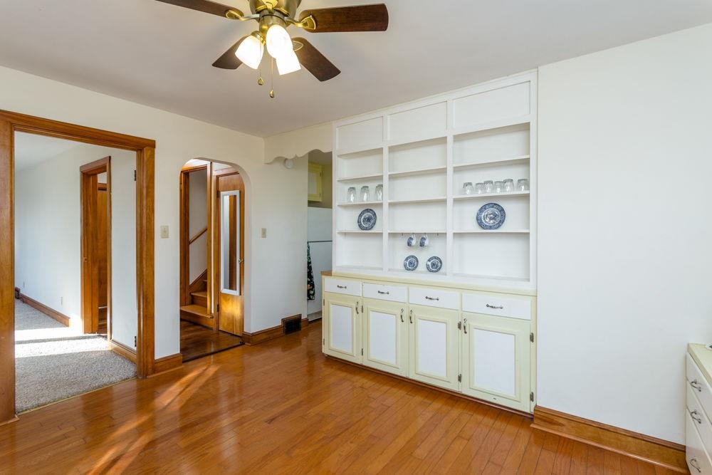 off of living room. Behind the built-in is the kitchen and hall to bedroom on main level.