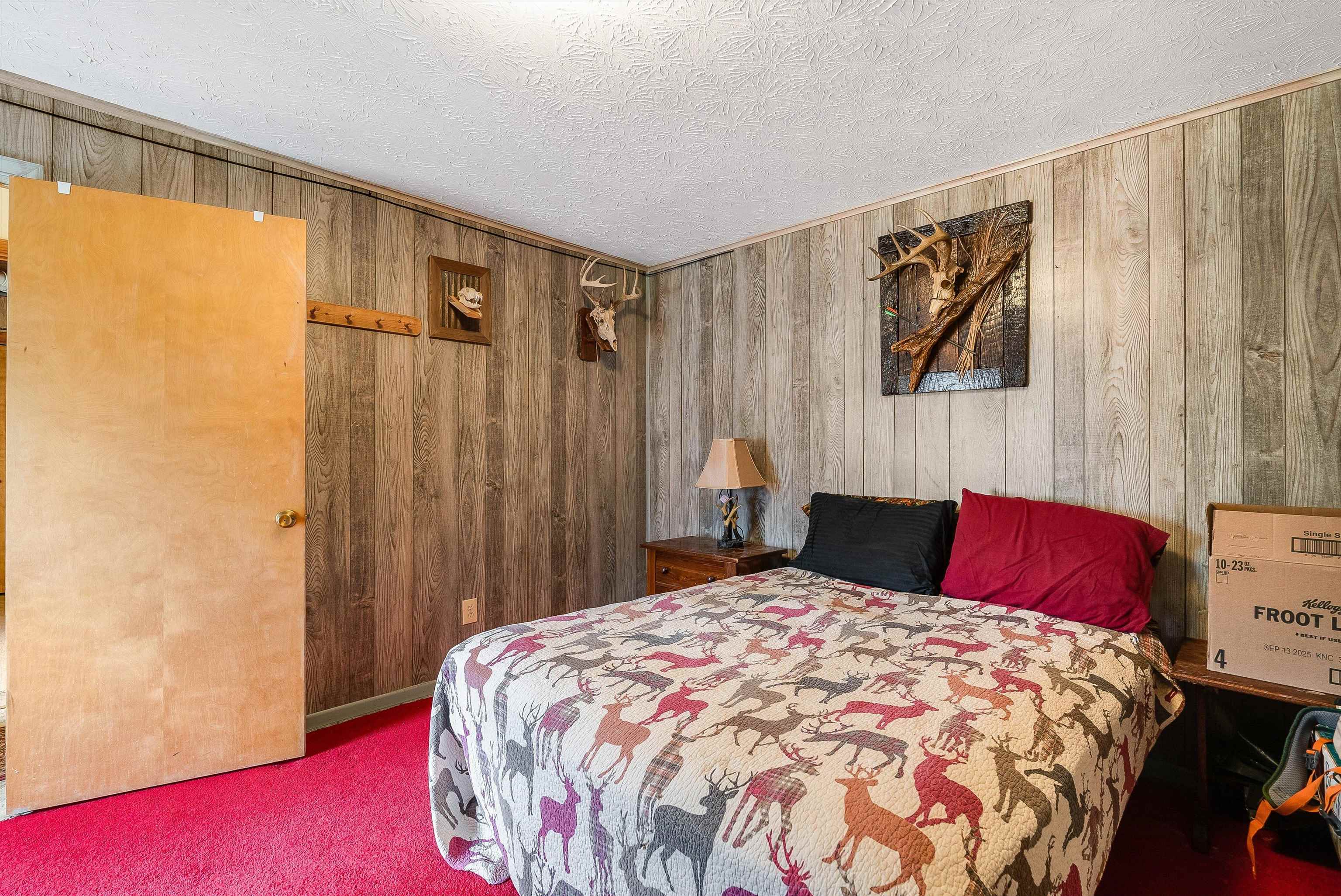 Bedroom has a closet and window.