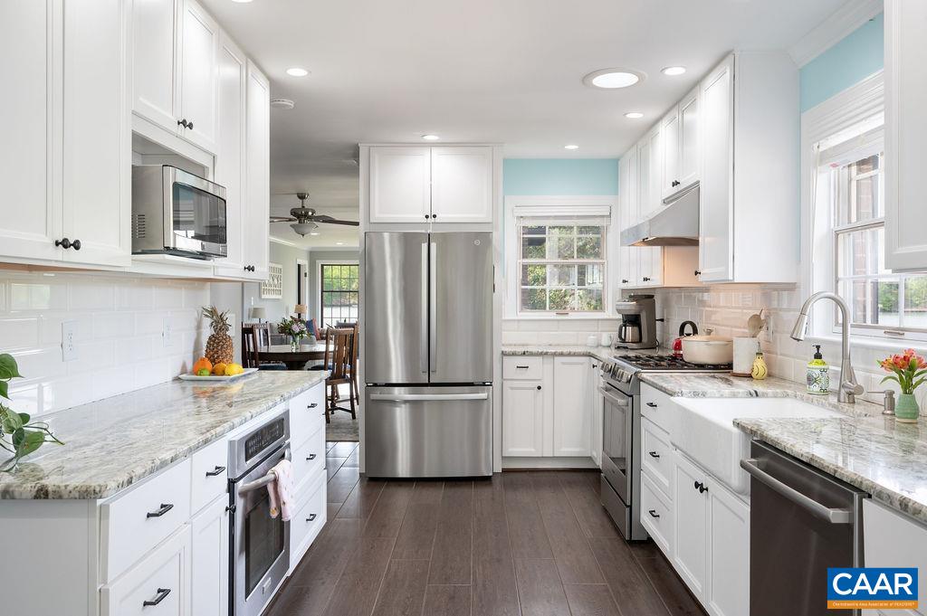 This house was made for entertaining, with a true multi cook kitchen that opens out onto the spacious back terrace.