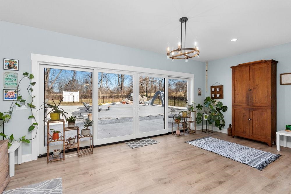 overlooking the pool and outdoor living area!