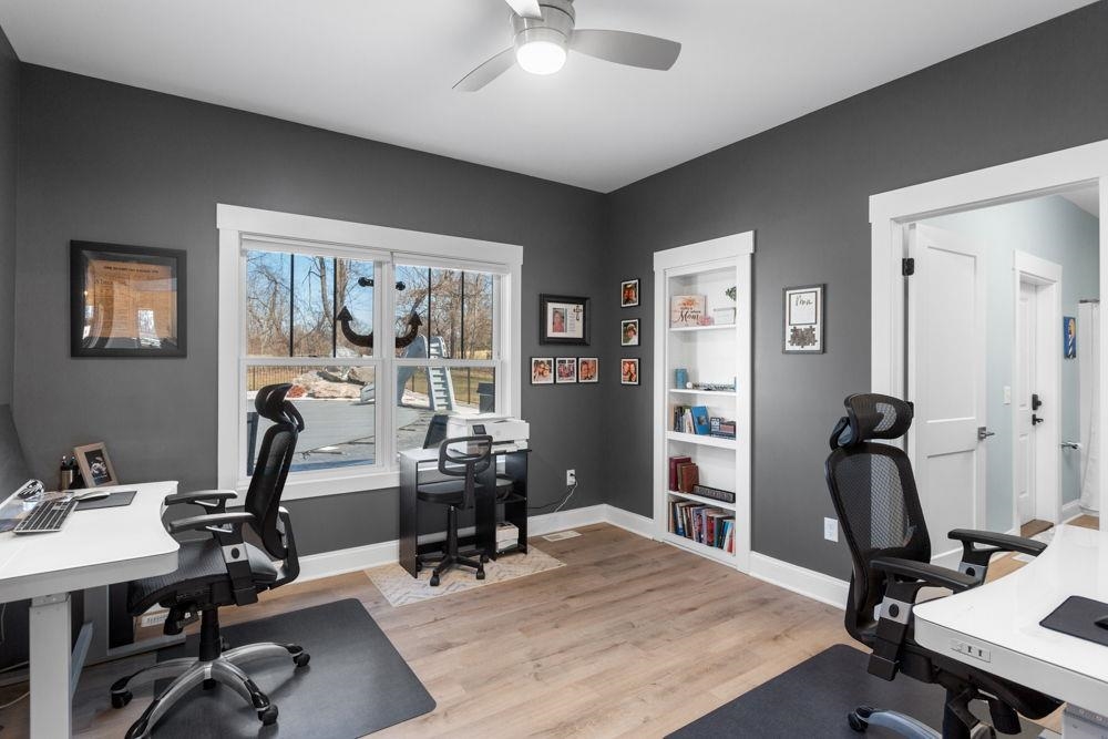 with full bath that has access to rear patio and pool area. Note: there is a hidden room behind the bookshelf with a wall safe and storage that is 5.3 x 7.2.